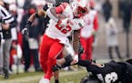 Utah running back Ty Jordan avoids Colorado safety Derrion Rakestraw for a long gain in the second half of an NCAA college football game Saturday, Dec