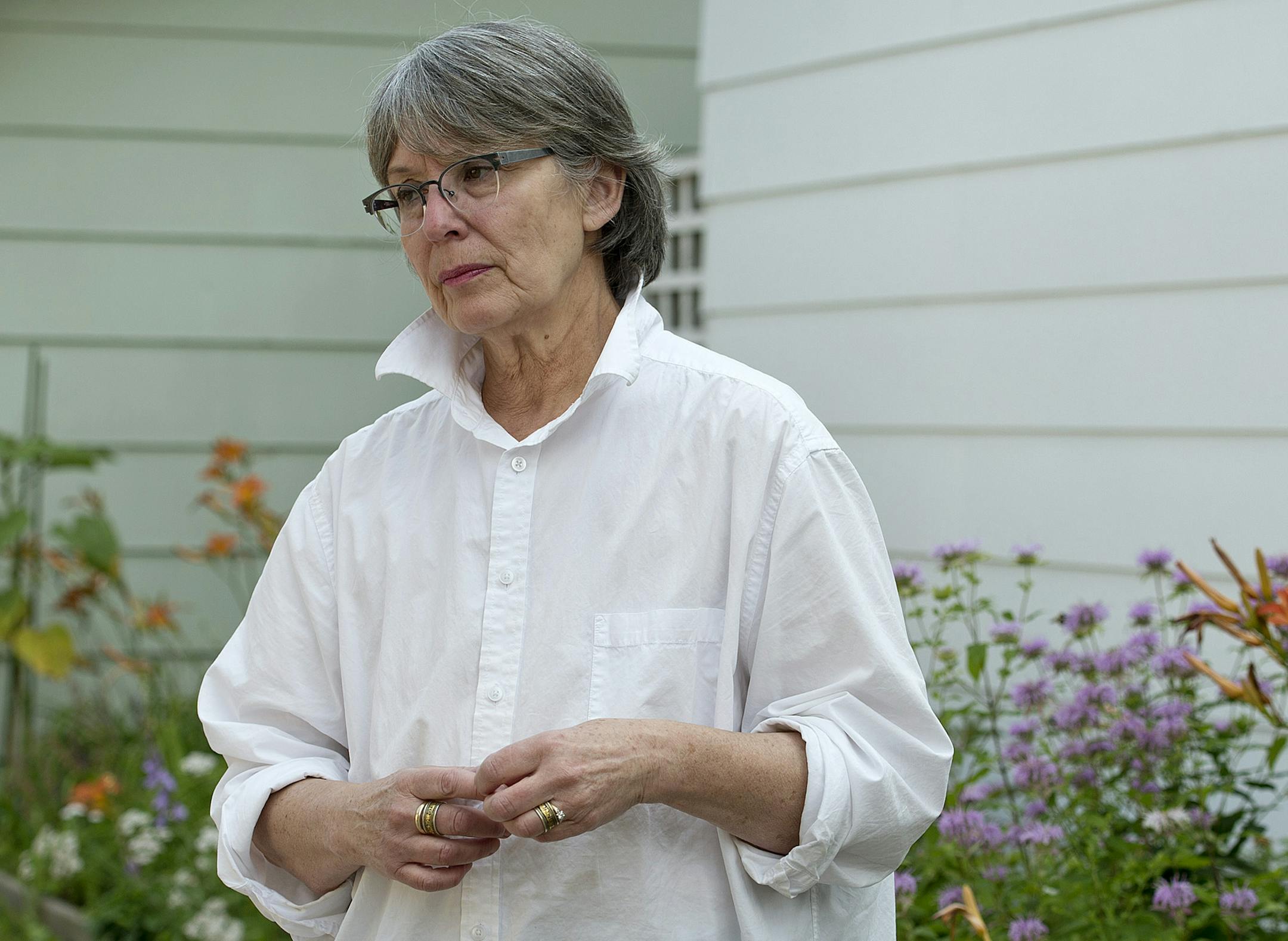Mika Gens says the honeybee problem in her backyard gardens have gotten out hand. ] (SPECIAL TO THE STAR TRIBUNE/BRE McGEE) **Mika Gens (south Minneapolis, bird watcher)