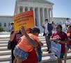 Demonstrators gather at the Supreme Court as the justices finish the term with key decisions on gerrymandering and a census case involving an attempt 