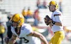 Minnesota quarterback Conor Rhoda warmed up on the field before Minnesota took on Maryland last week. The backup is expected to start again this week,