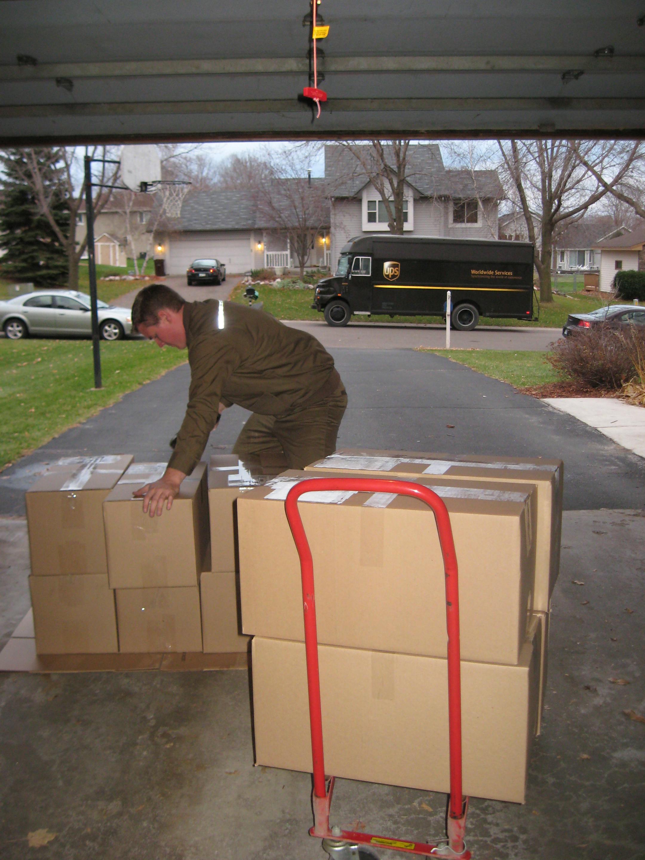 UPS driver Randy J. Lewis loaded 10 boxes containing 2,000 CDs to be shipped to New York for MP3 conversion.