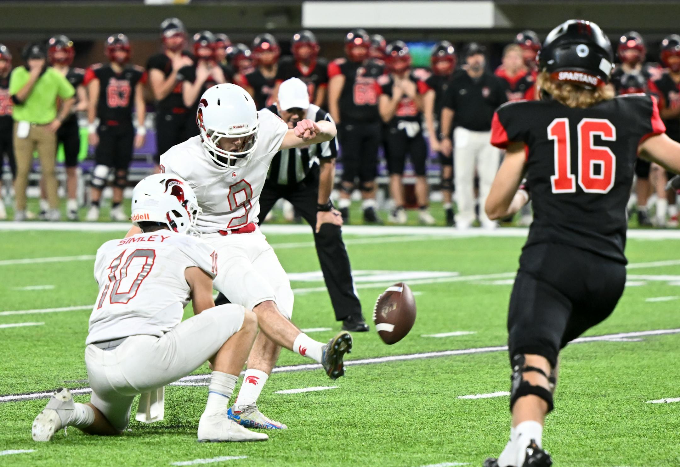 Simley kicker Reid Remackel (9) kicks what would be the game-winning field goal during the fourth quarter.
