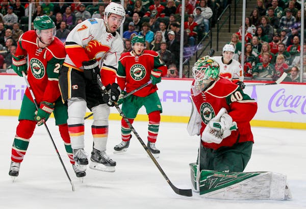 Ryan Suter (left) and goalie Devan Dubnyk have been named to the NHL All-Star Game.