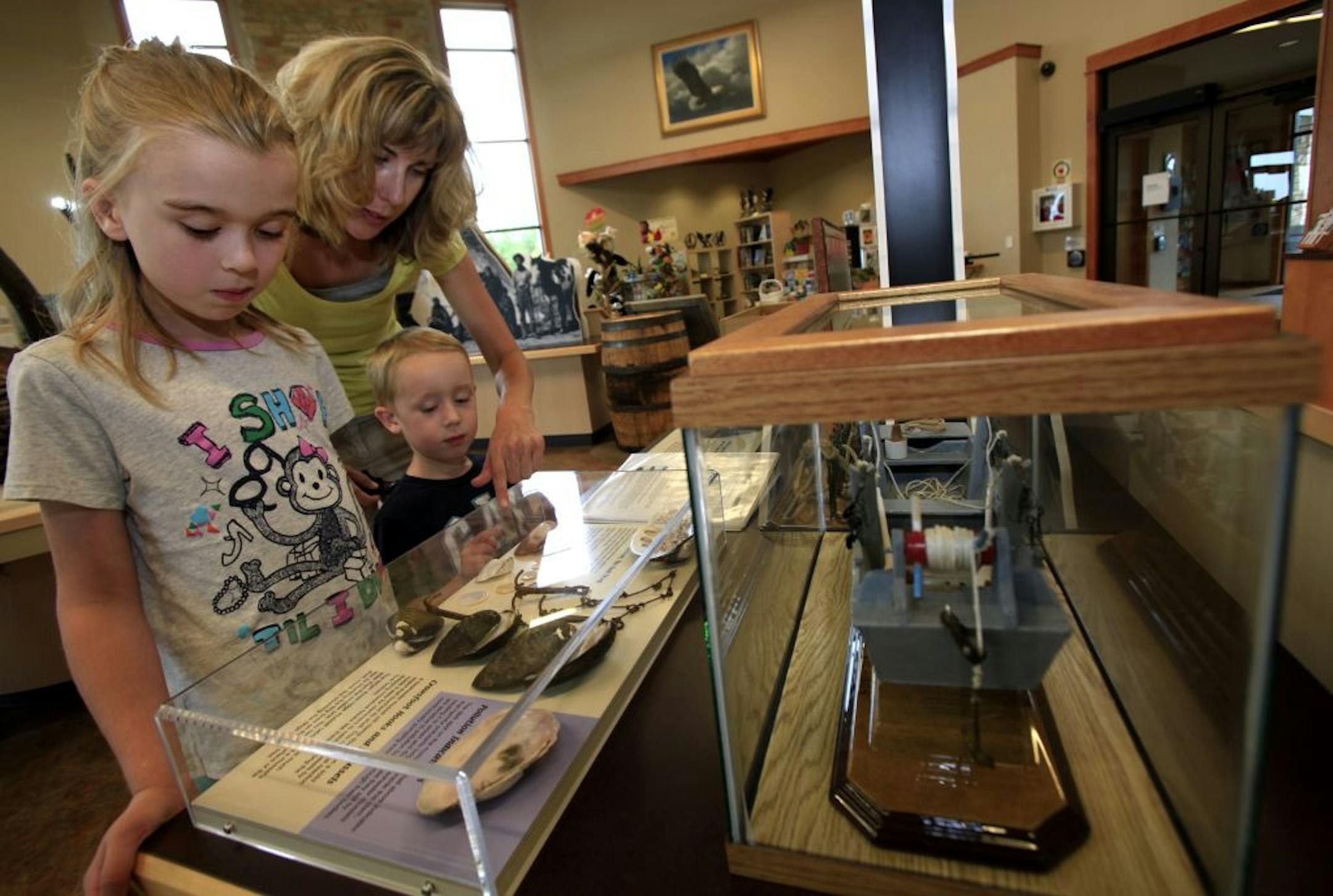 Mary Chesney of Prescott, Wisconsin visit the NPS visitor's center with her daughter Kira ( 8 years old), and her son Jacob ( 4years old) to visit the exhibits. October 1, 2012.