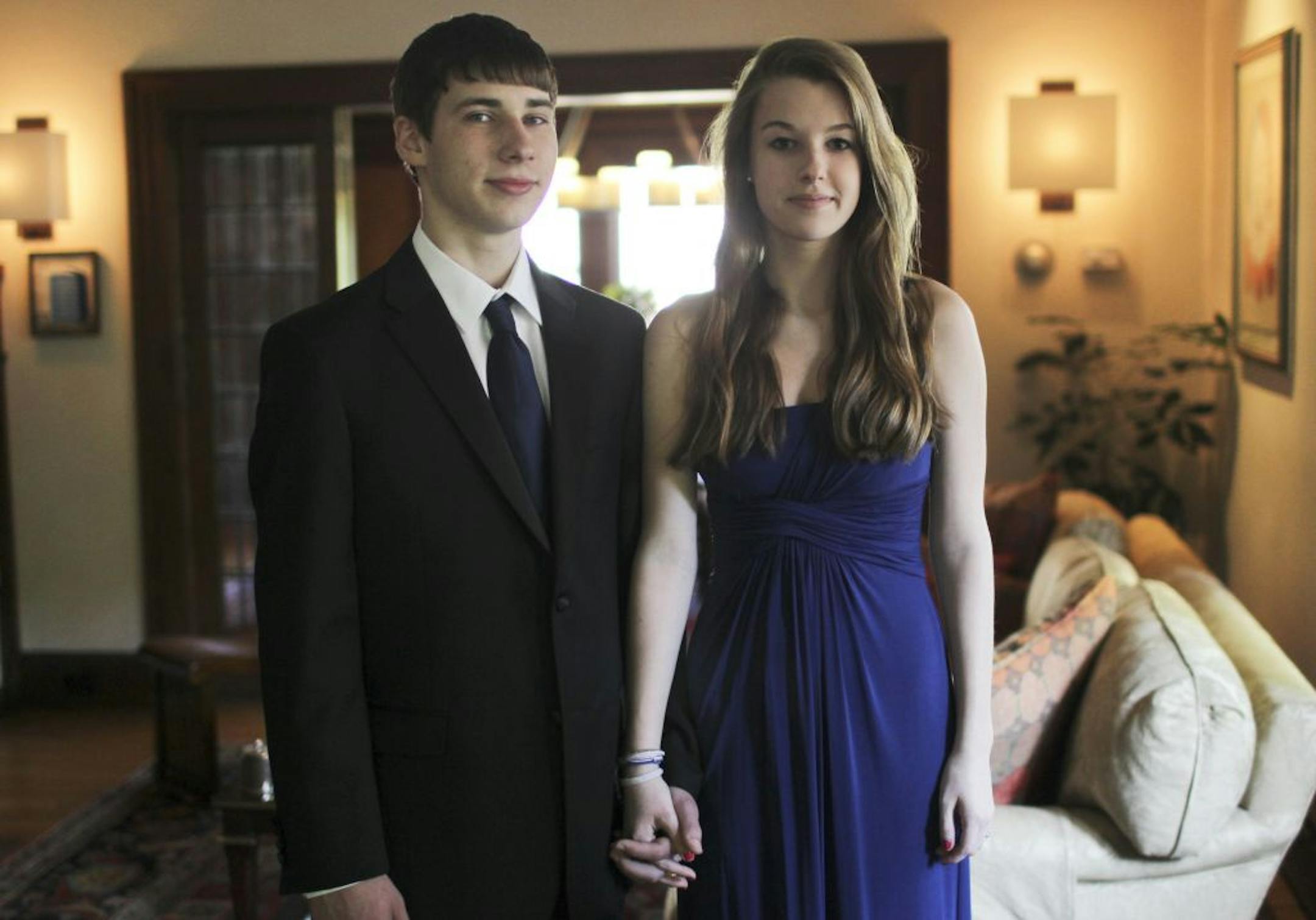 Max Horn, 17, a junior at Southwest High and his girlfriend Nina Lillehei, 16, a sophomore at Blake School, posed for a photograph Tuesday, May 15, 2012, in the outfits they purchased to attend the upcoming Southwest High in Minneapolis MN. This year, however, they have been told by administration sophomores will not be allowed to attend, per the school rule book. In years past, sophomores have attended the prom because the administration had "made exceptions" to the school rule book, Horn said.