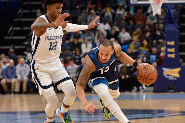 Timberwolves guard Shabazz Napier (13) entered Tuesday's game against the Grizzlies having scored 20 or more points in four consecutive games, but onl