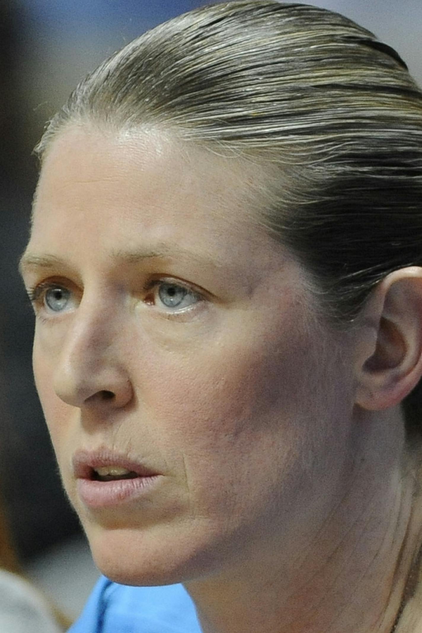 FILE - In this June 16, 2016, file photo, New York Liberty associate head coach Katie Smith watches from the bench during the first half of a WNBA basketball game in Uncasville, Conn. Smith is getting a chance to be a head coach for a game. The Liberty's associate head coach will lead New York on Tuesday night, Sept. 13, 2016, against the Washington Mystics. (AP Photo/Jessica Hill, File) ORG XMIT: MIN2016102021244637