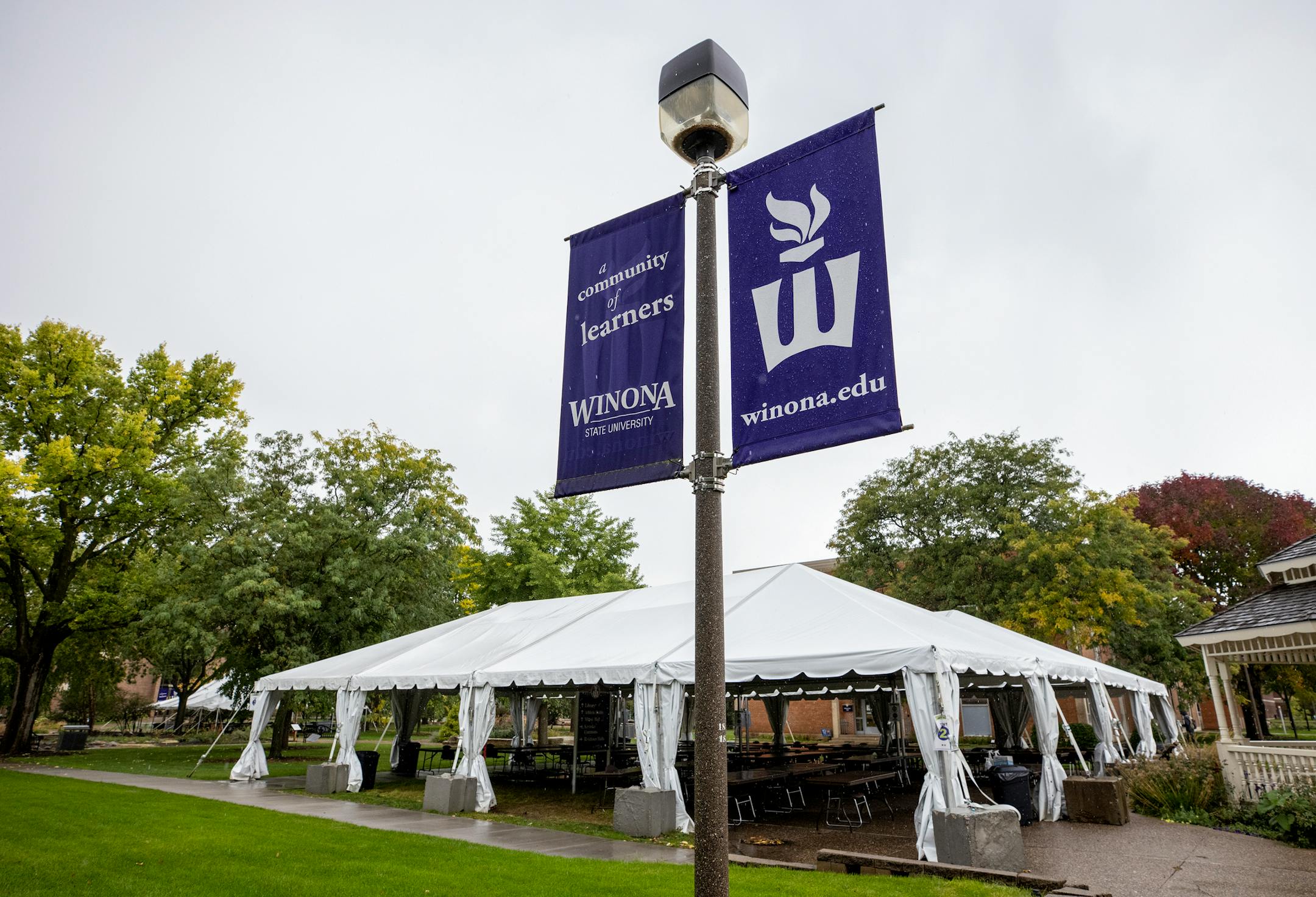 Tents were set up on the campus of Winona State University to host outdoor classes. ] CARLOS GONZALEZ • cgonzalez@startribune.com – Winona, MN, – September 24, 2020, A sense of normalcy has returned to college towns across Minnesota since the start of the fall semester, but with it has come increases in COVID-19 cases and greater risk to small communities like Winona,