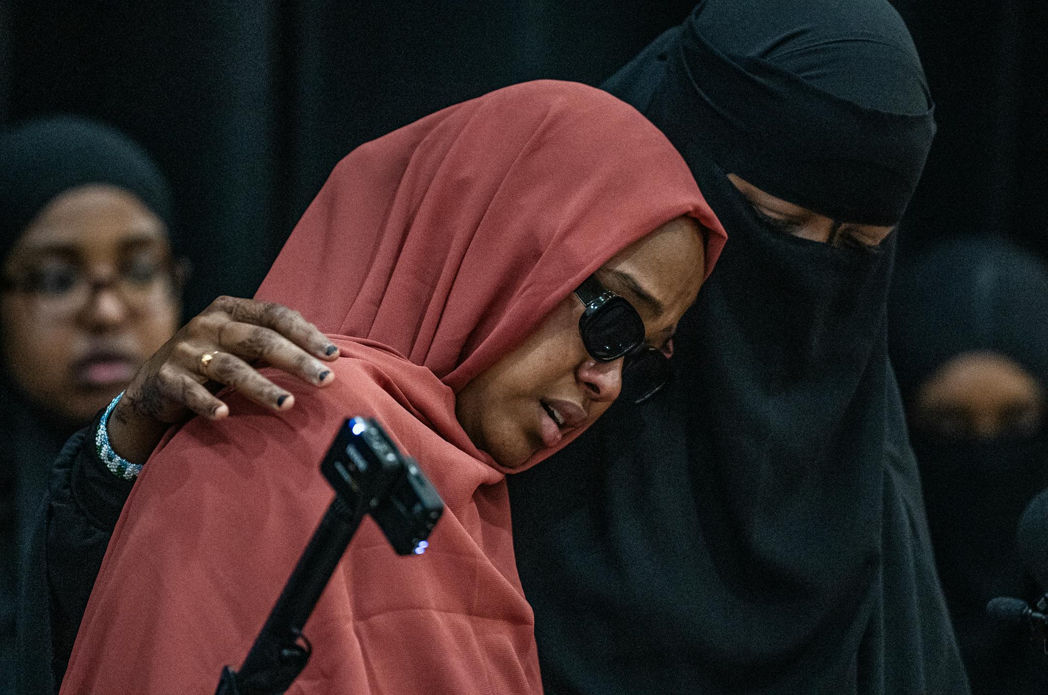 Sundus Adan Odhowa and Sundus Mohamoud Ali(L to R) speak at a press conference calling for an independent investigation of a crash that killed five loved ones in Bloomington, Minn., on Monday, June 26, 2023. CAIR-MN is calling for an independent investigation of the crash that killed five in Minneapolis.