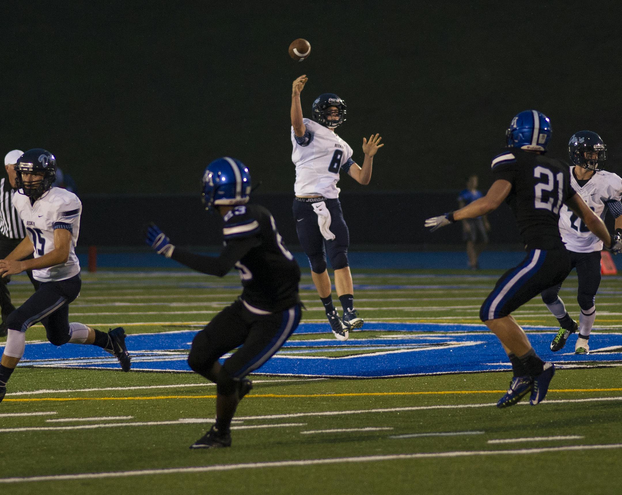 Becker quarterback Bryce Boser leads a drive downfield. ] (Matthew Hintz, 083014, Minnetonka)