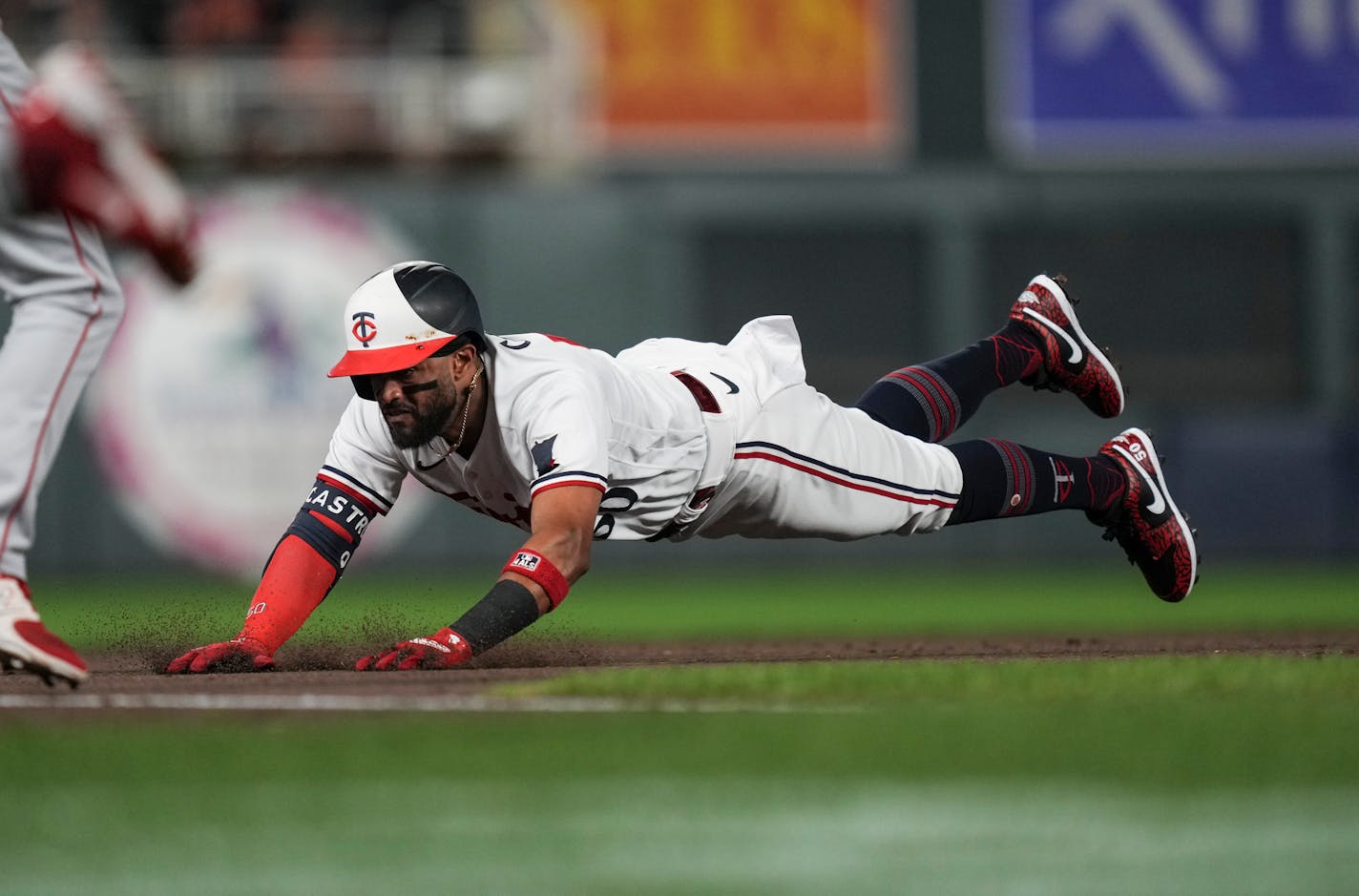 Minnesota Twins third baseman Willi Castro (50) dives into third base on a triple in the fourth inning. The Minnesota Twins hosted the Los Angeles Angels at Target Field on Friday, Sept. 22, 2023 in Minneapolis, Minn. ] RENEE JONES SCHNEIDER • renee.jones@startribune.com