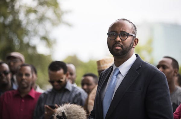 Jaylani Hussein, the executive director of CAIR-MN speaks during a press conference.