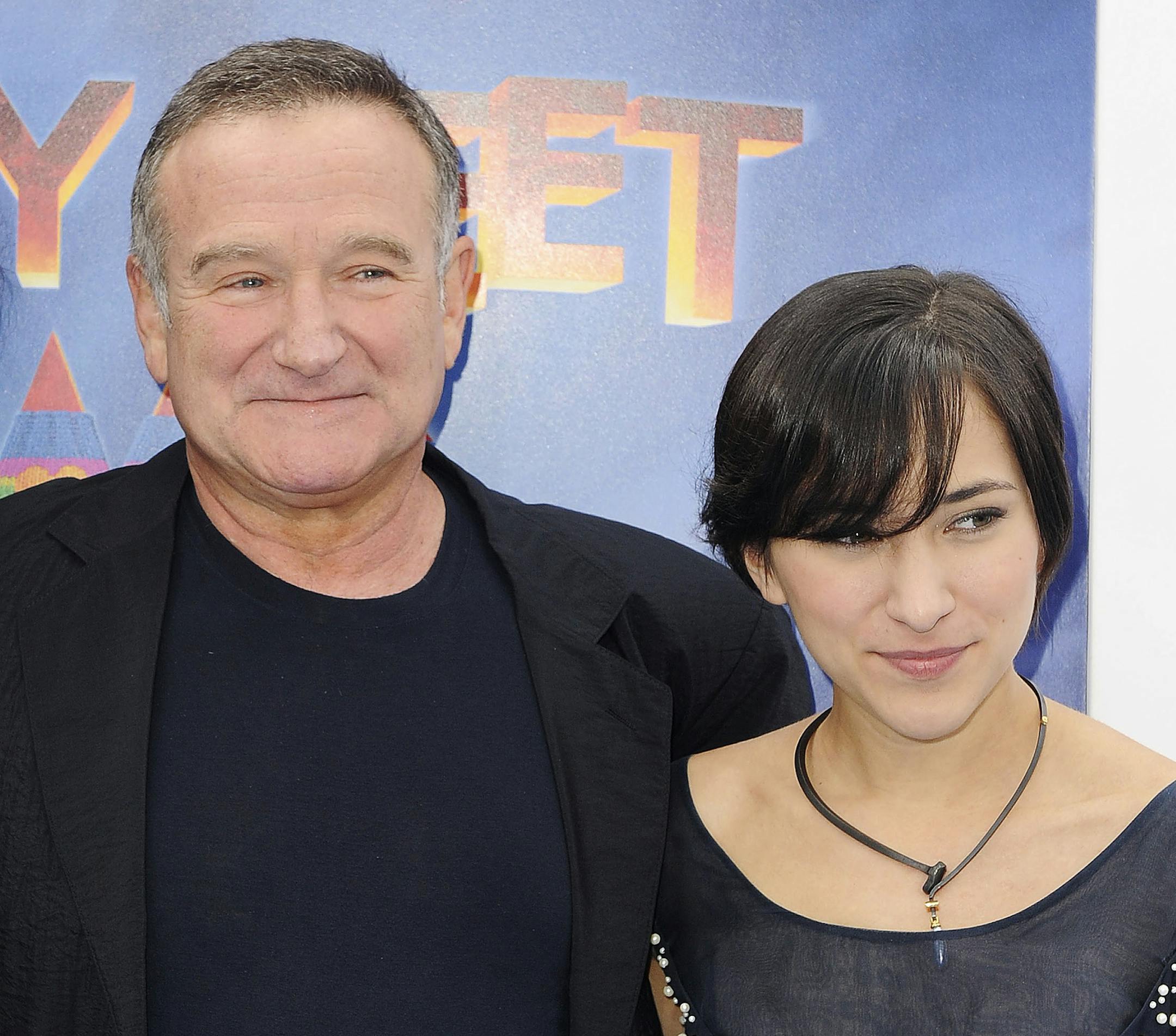 Robin Williams, at left, and his daughter, Zelda Wiliams, arrive at the premiere of "Happy Feet Two" at Grauman's Chinese Theater, Sunday, Nov. 13, 2011, in Los Angeles.