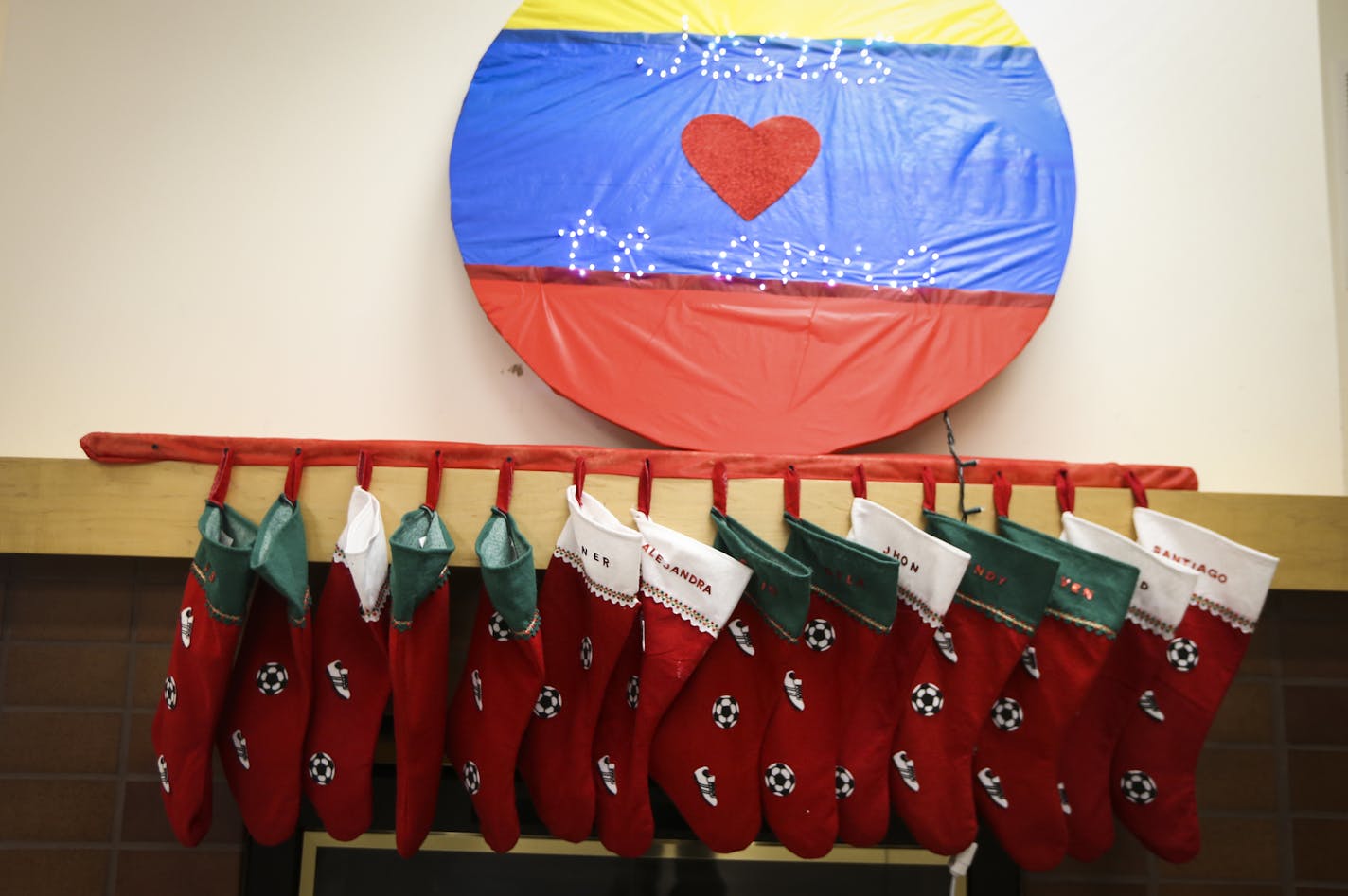 Stockings for all the visiting orphans hung on the fireplace at the Ona Orth retreat center in Shoreview, Minn., on Wednesday, December 3, 2014. ] REN&#xc9;E JONES SCHNEIDER reneejones@startribune.com Fourteen orphans from Colombia have been in the Twin Cities since around Thanksgiving, enjoying the holidays -- and hoping to find Minnesota families willing to take them into their homes. Last year, 11 orphans in the program all found a home here. This year, less media attention has meant that a h