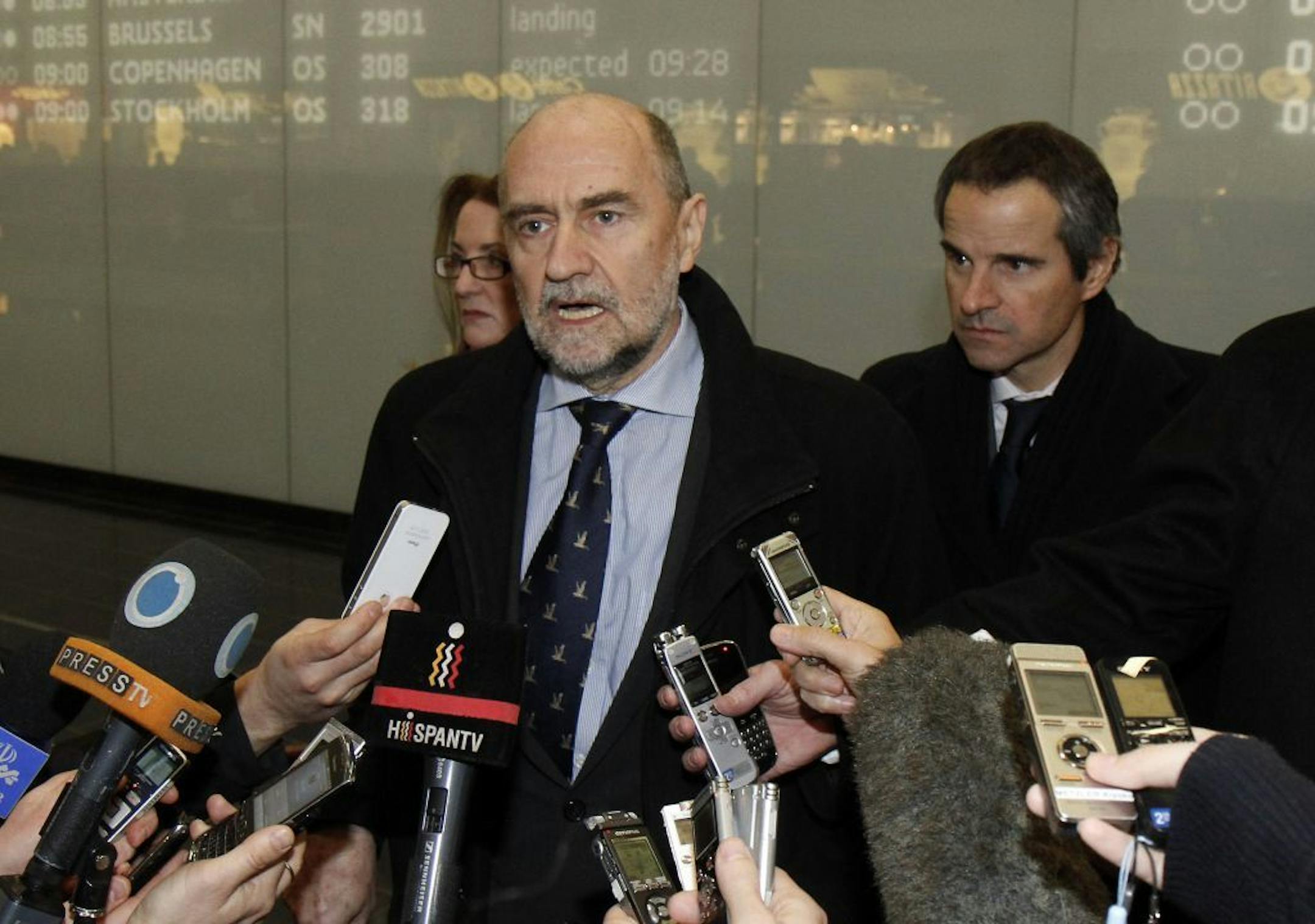Herman Nackaerts, center, Deputy Director General and Head of the Department of Safeguards of the International Atomic Energy Agency, IAEA, talks to media after his arrival from Iran at Vienna's Schwechat airport, Austria,Thursday, Feb. 14, 2013. Senior officials of the U.N. atomic agency have returned from Tehran without a hoped-for deal that would have led to the resumption of a probe into allegations that Iran worked secretly on nuclear arms.