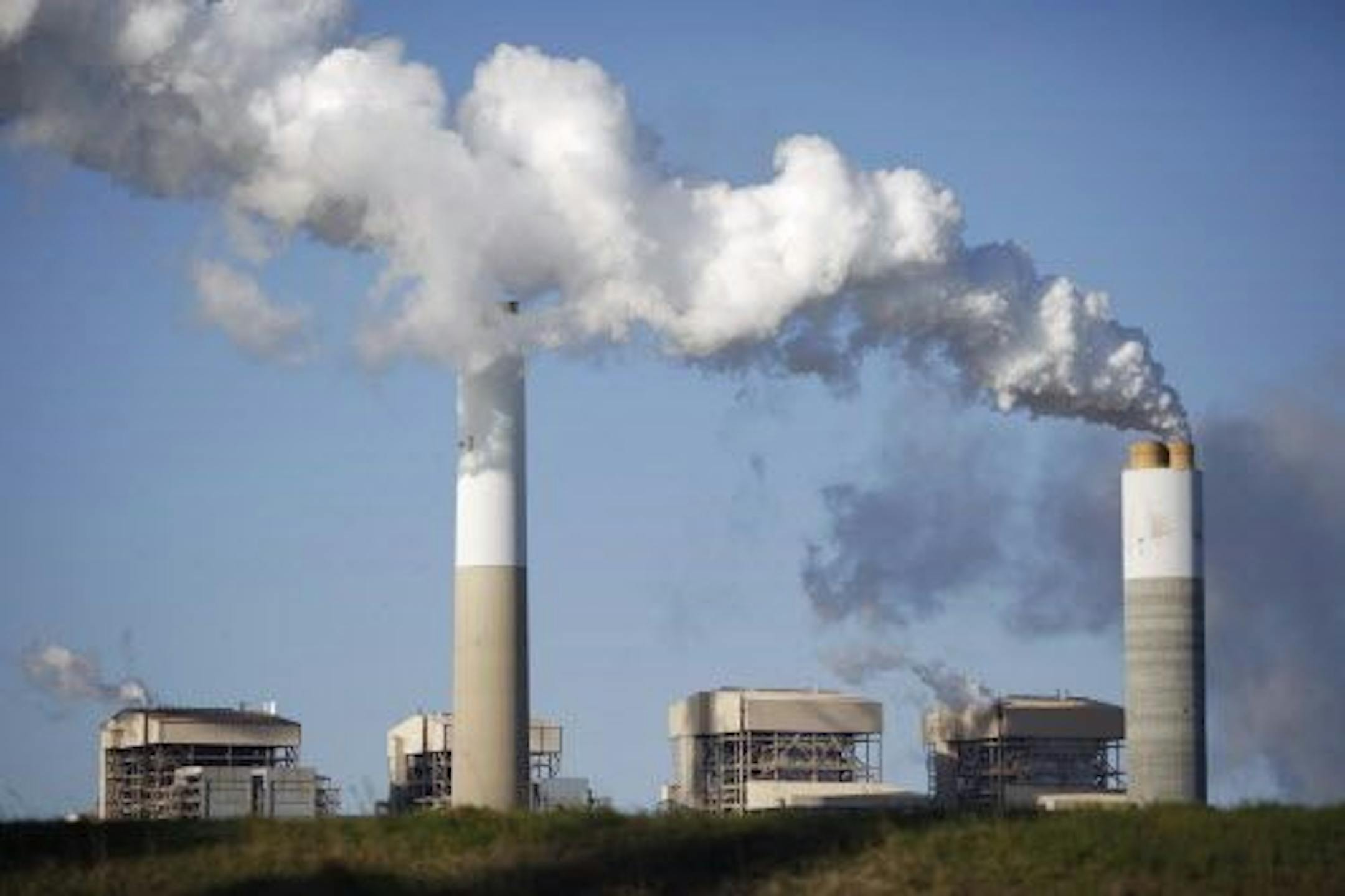 Emissions rise from the coal fired Santee Cooper Cross Generating Station power plant in Pineville, S.C., in March.