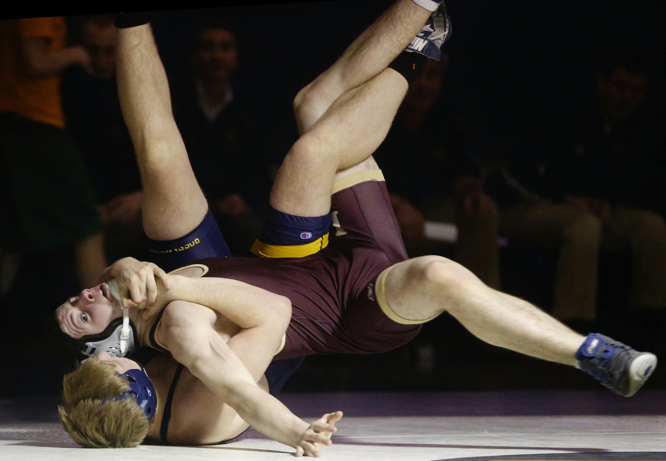 Lakeville South's Kayin Johnson, top, battled Evan Sutherland of Rosemount during a recent dual meet.