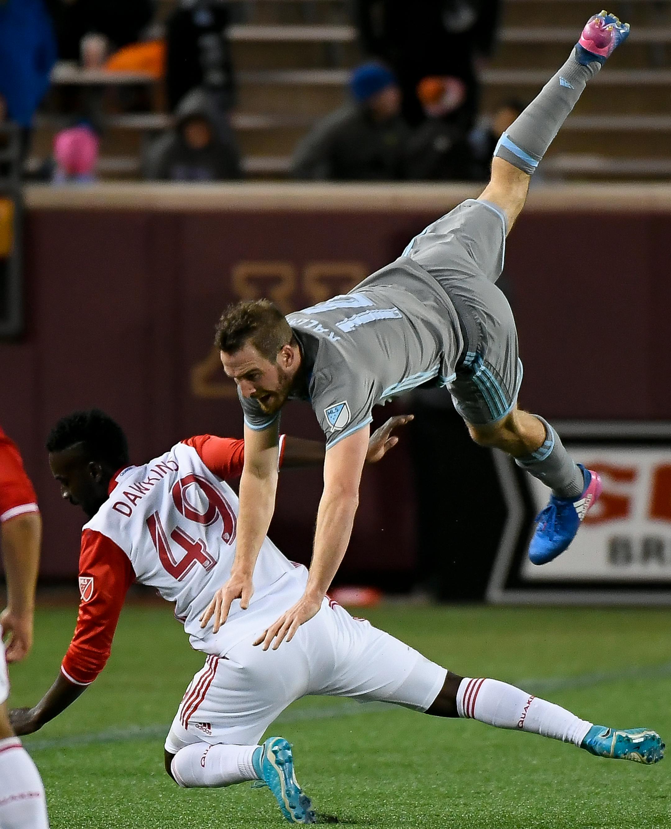 Minnesota United defender Brent Kallman (14) was upended after colliding with San Jose Earthquakes forward Simon Dawkins (49) as they went after a goal kick in the second half. ] AARON LAVINSKY &#xef; aaron.lavinsky@startribune.com Minnesota United played the San Jose Earthquakes on Saturday, April 29, 2017 at TCF Bank Stadium in Minneapolis, Minn.