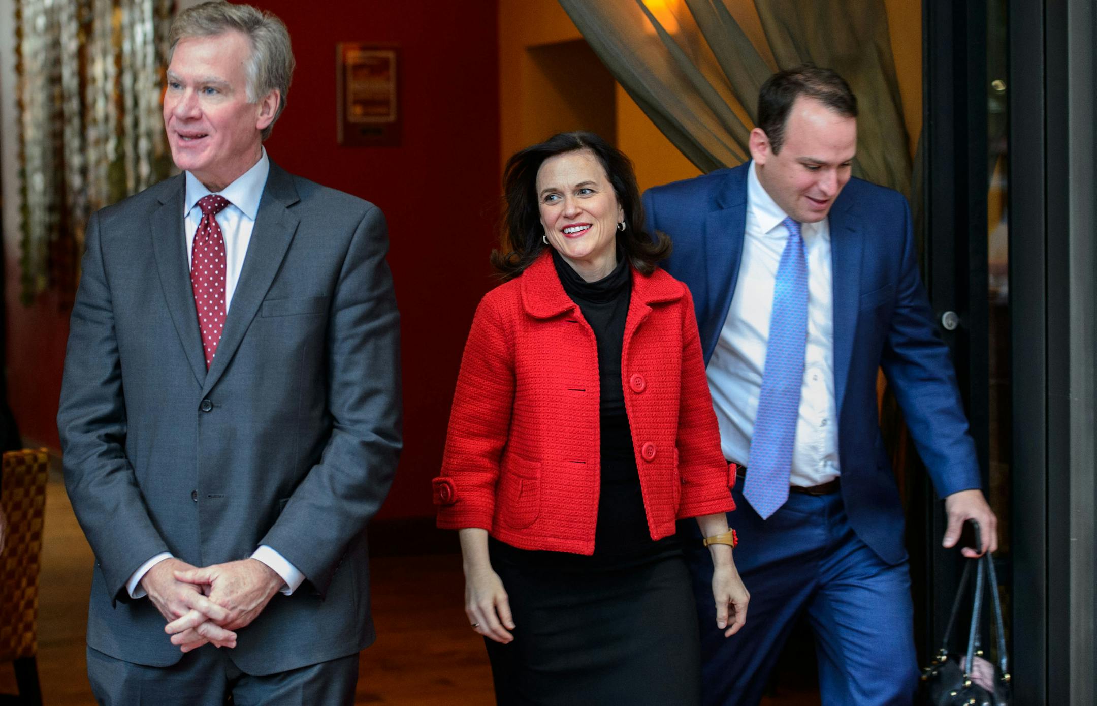 Mayor Chris Coleman and Mayor-Elect Betsy Hodges emerged from lunch at Mission American Kitchen in Minneapolis. On the right is Coleman's Communications Director Joe Campbell. Coleman later presented Hodges with a framed print of the 612 and 651 area codes of the Twin Cities and the two said they talked about ways for cooperation between the cities. Thursday, November 7, 2013. ] GLEN STUBBE * gstubbe@startribune.com Mayor Chris Coleman and Mayor-Elect Betsy Hodges emerged from lunch at Mission A