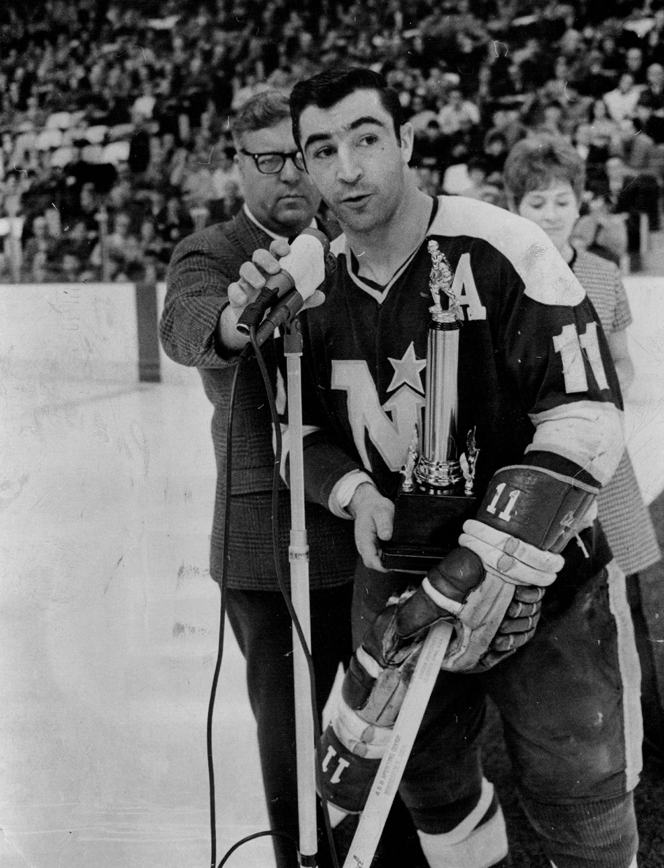 April 2, 1970 Most Valuable North Star -- J.P. Parise accepted the Bill Masterton Memorial Trophy.
