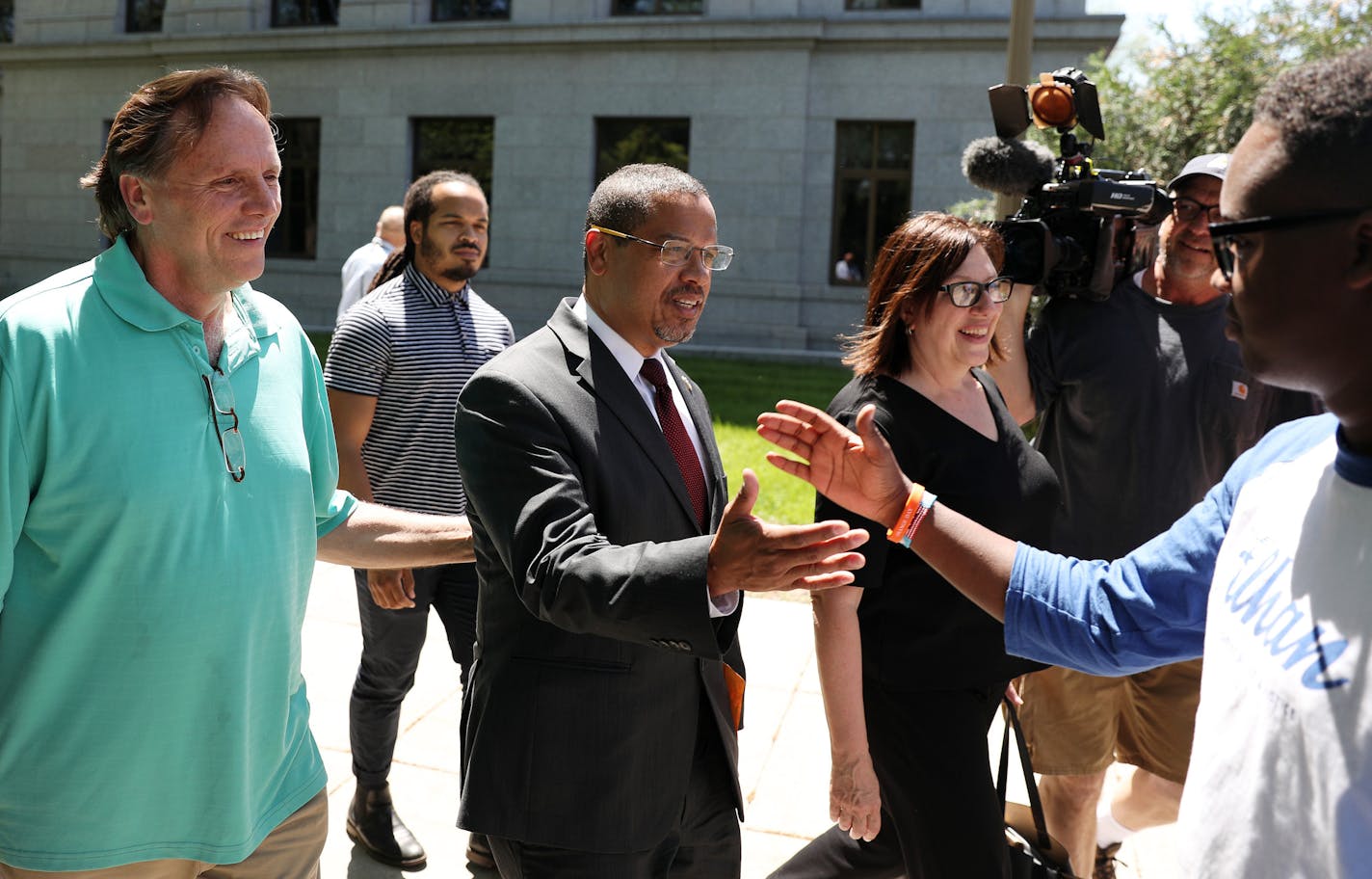 Democratic U.S. Rep. Keith Ellison was greeted by his son and supporters after filing to run for Minnesota attorney general. ] ANTHONY SOUFFLE &#xef; anthony.souffle@startribune.com Candidates rushed to add their names to the races before the 5 p.m. Tuesday, June 5, 2018 deadline for filing to Minnesota's August primary ballot at the Minnesota Secretary of State's Office in St. Paul, Minn. With Lori Swanson out of AG and into governor's race, there could yet be more big last entries to some of t