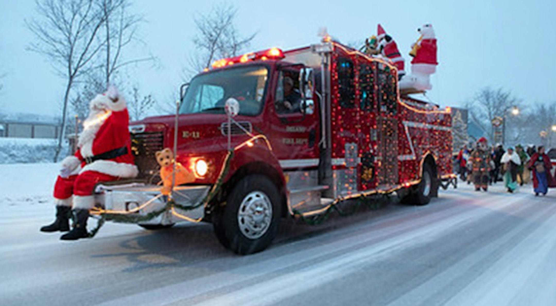 Santa on a firetruck at Delano's Old-Fashioned Christmas.
