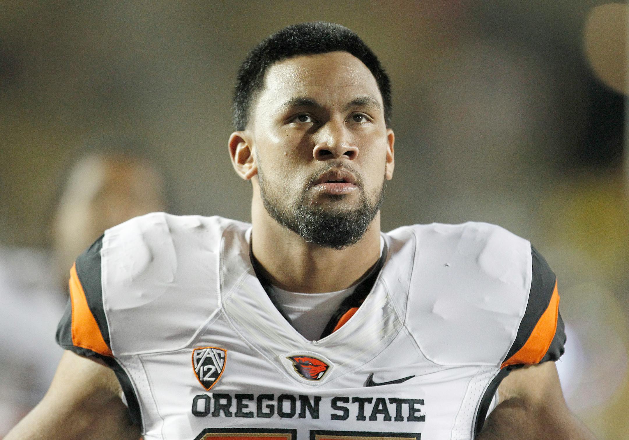 Oregon State defensive end Scott Crichton (95) warms up before an NCAA college football game against California in Berkeley, Calif., Saturday, Oct. 19, 2013. Oregon State won 49-17.(AP Photo/Tony Avelar)