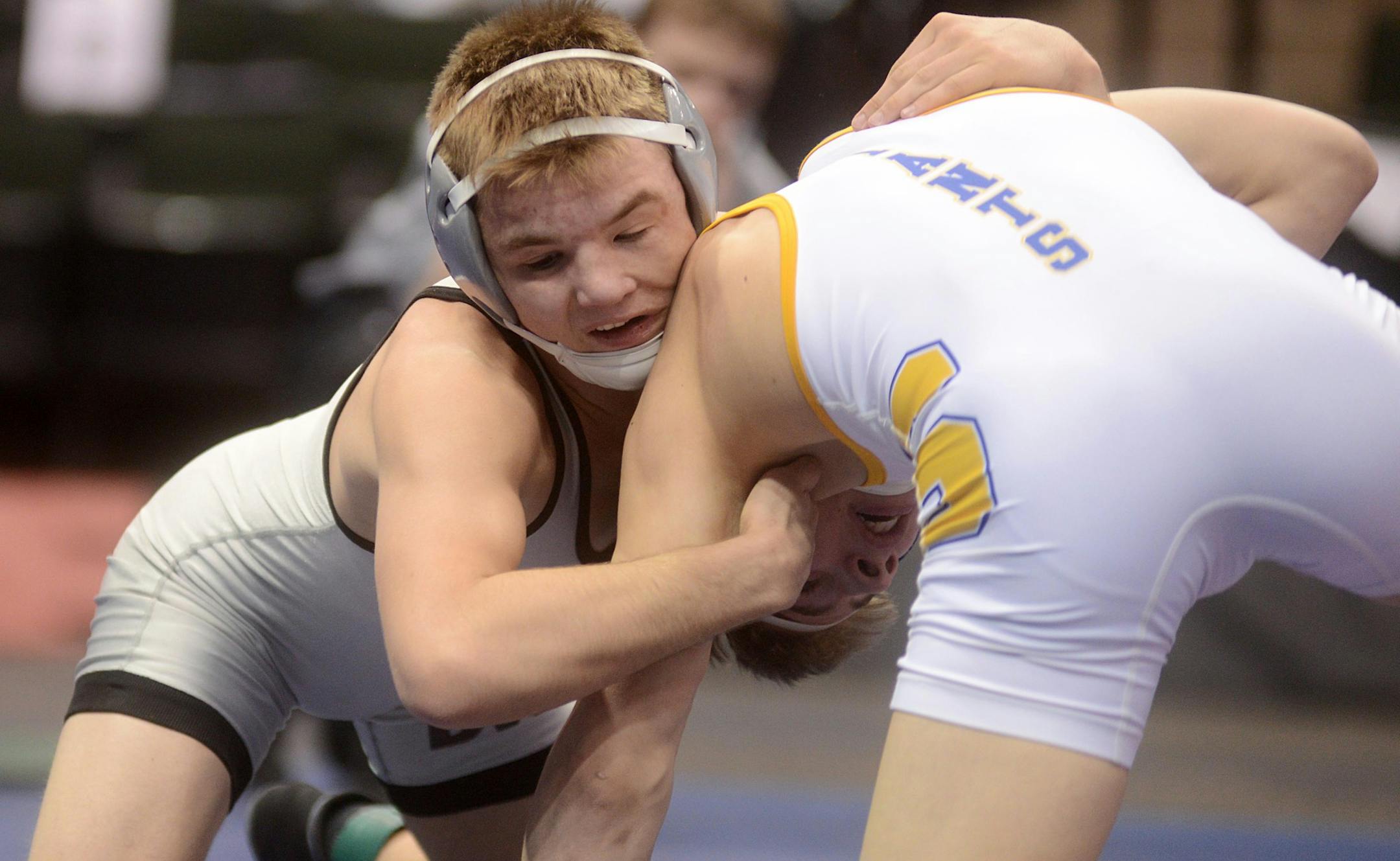 Cameron Sykora of Border West wrestles against Austin Anderly of LeSueur-Henderson.] Sykora won. BRIDGET BENNETT SPECIAL TO THE STAR TRIBUNE • bridget.bennett@startibune.com 690 126/ Cameron Sykora, Border West, vs. Austin Anderly, LeSueur-Henderson Class 1A weight class 126 wrestling individual championships Saturday evening at the Xcel Energy Center in St. Paul, MN