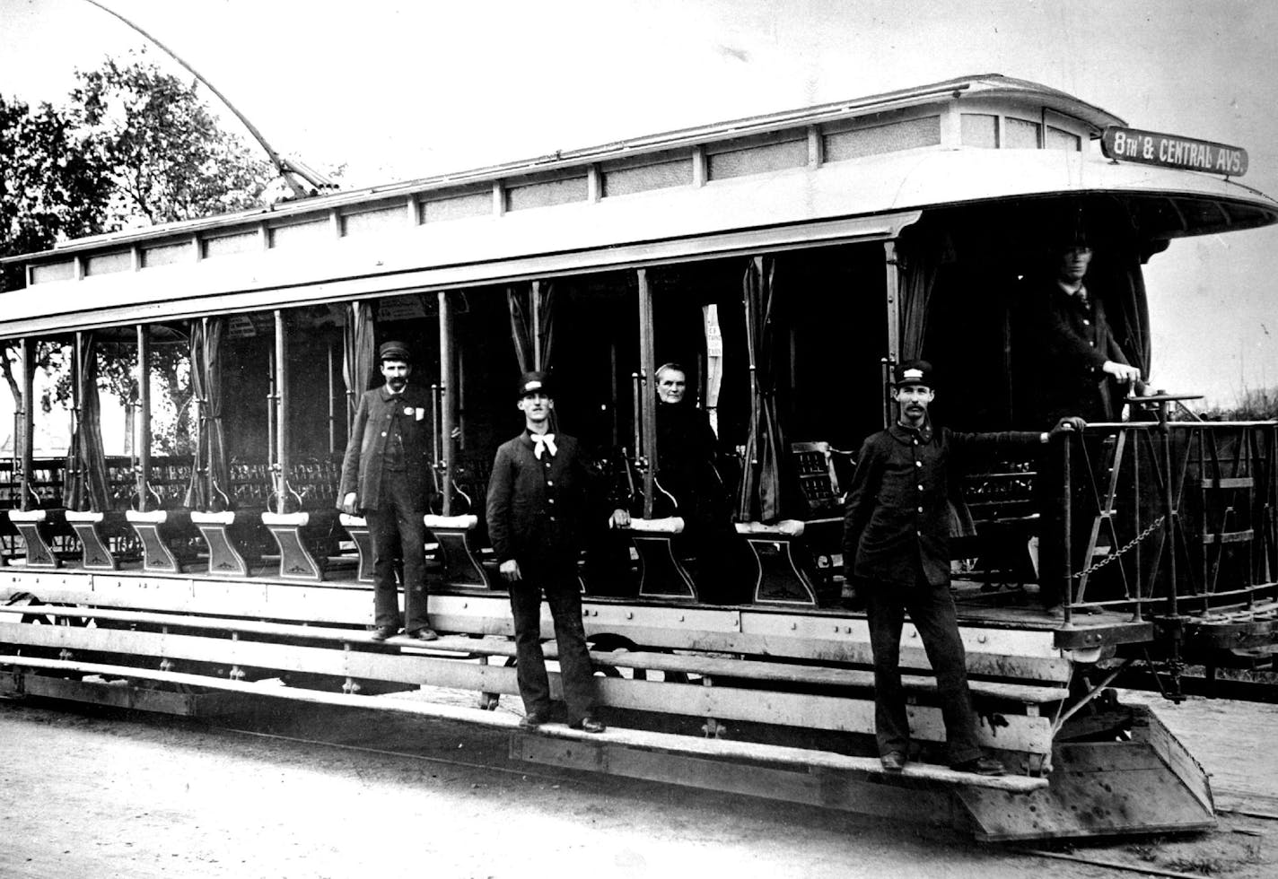 This turn-of-the-century electric streetcar was an open-air model used in the Twin Cities. Buses replaced streetcars in 1954.