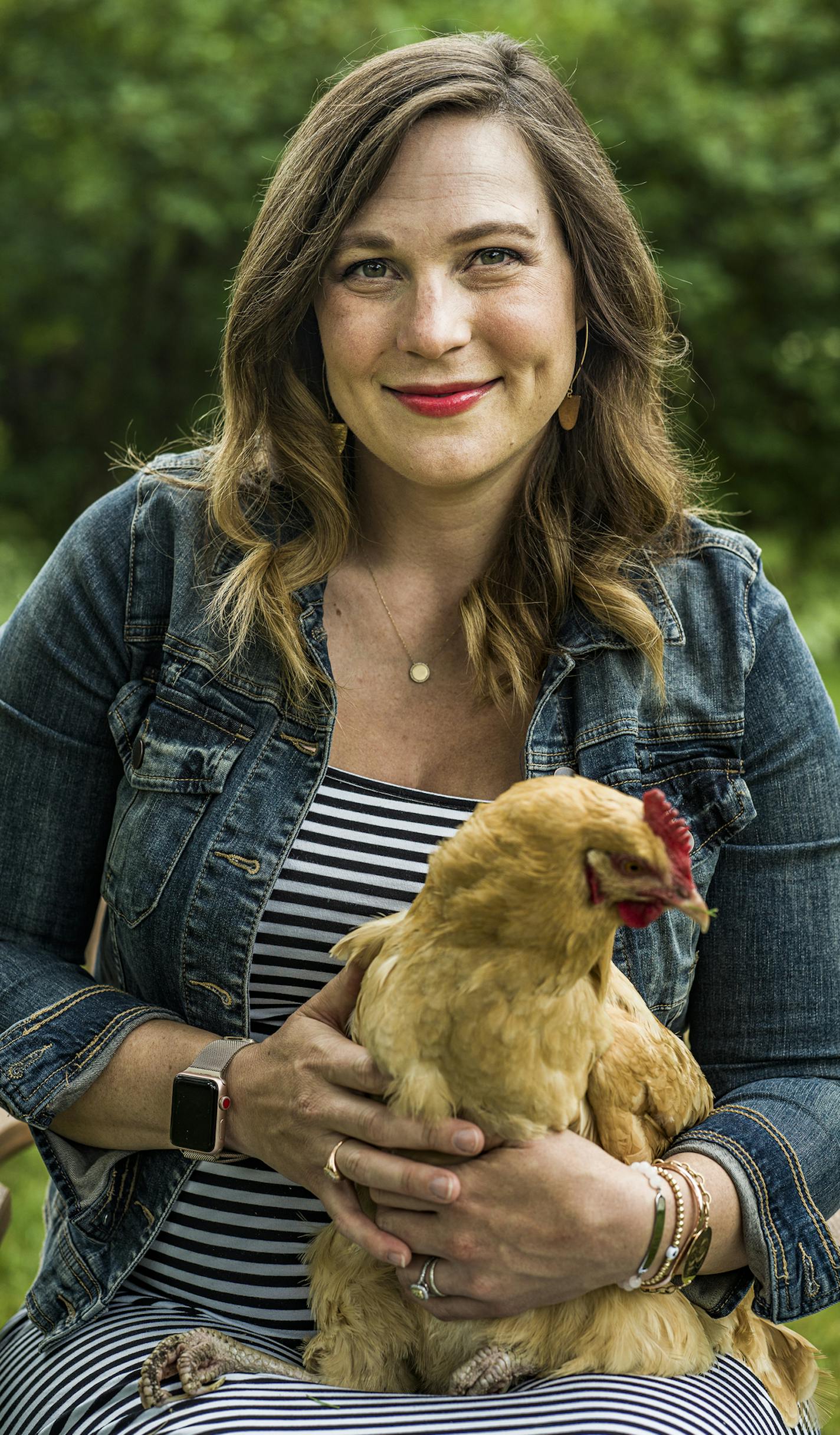 Elizabeth Ries loves her chickens and feed them premium feed. In return, they help fertilize her vegetable and herb garden. Chickens have made a resurgence during the pandemic.] RICHARD TSONG-TAATARII • richard.tsong-taatarii@startribune.com