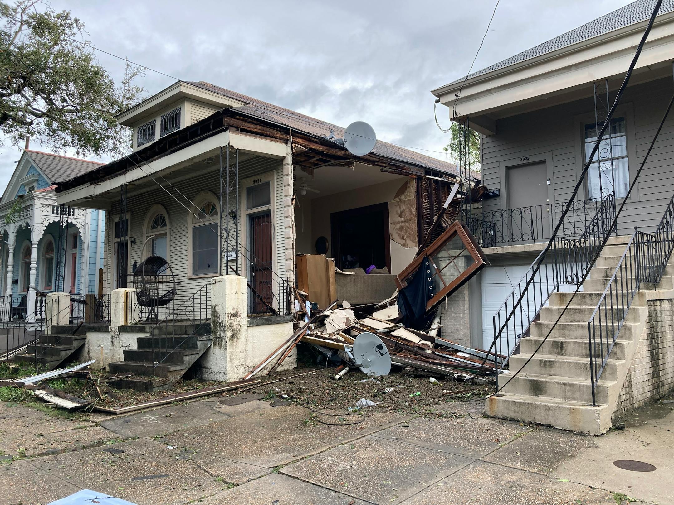 This Monday, Aug. 30, 2021 photo shows a house in the mid city neighborhood of New Orleans where Chris Atkins and his wife were when the sheet rock came off during Hurricane Ida Sunday. (AP Photo/Rebecca Santana)