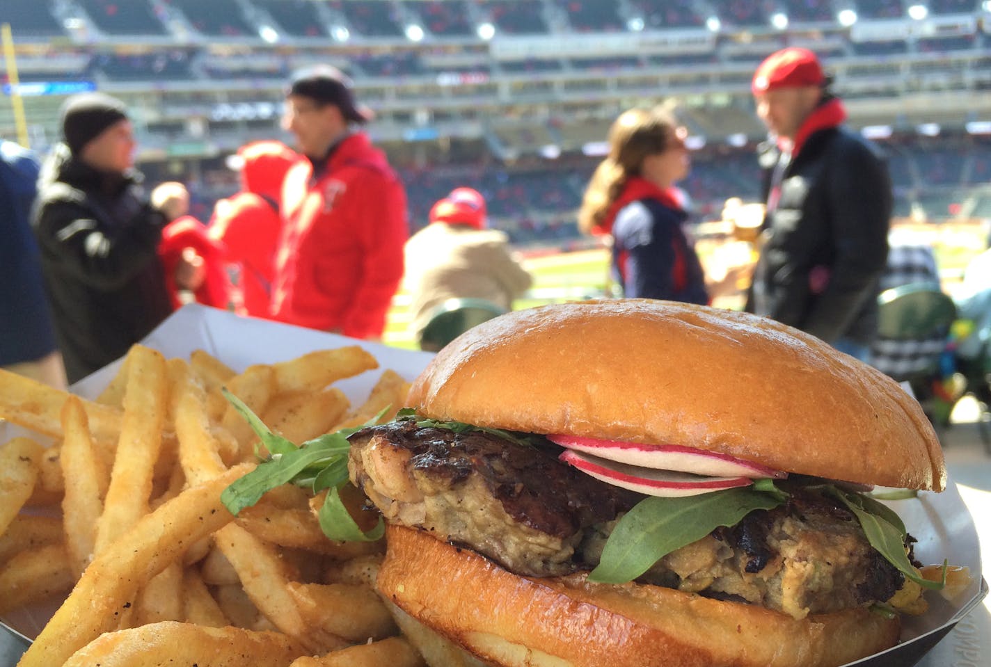 Red Cow's juicy turkey burger is served with thin radish slices, crunchy pistachios and a peppy cilantro-lime aioli, plus the ballpark's best fries.