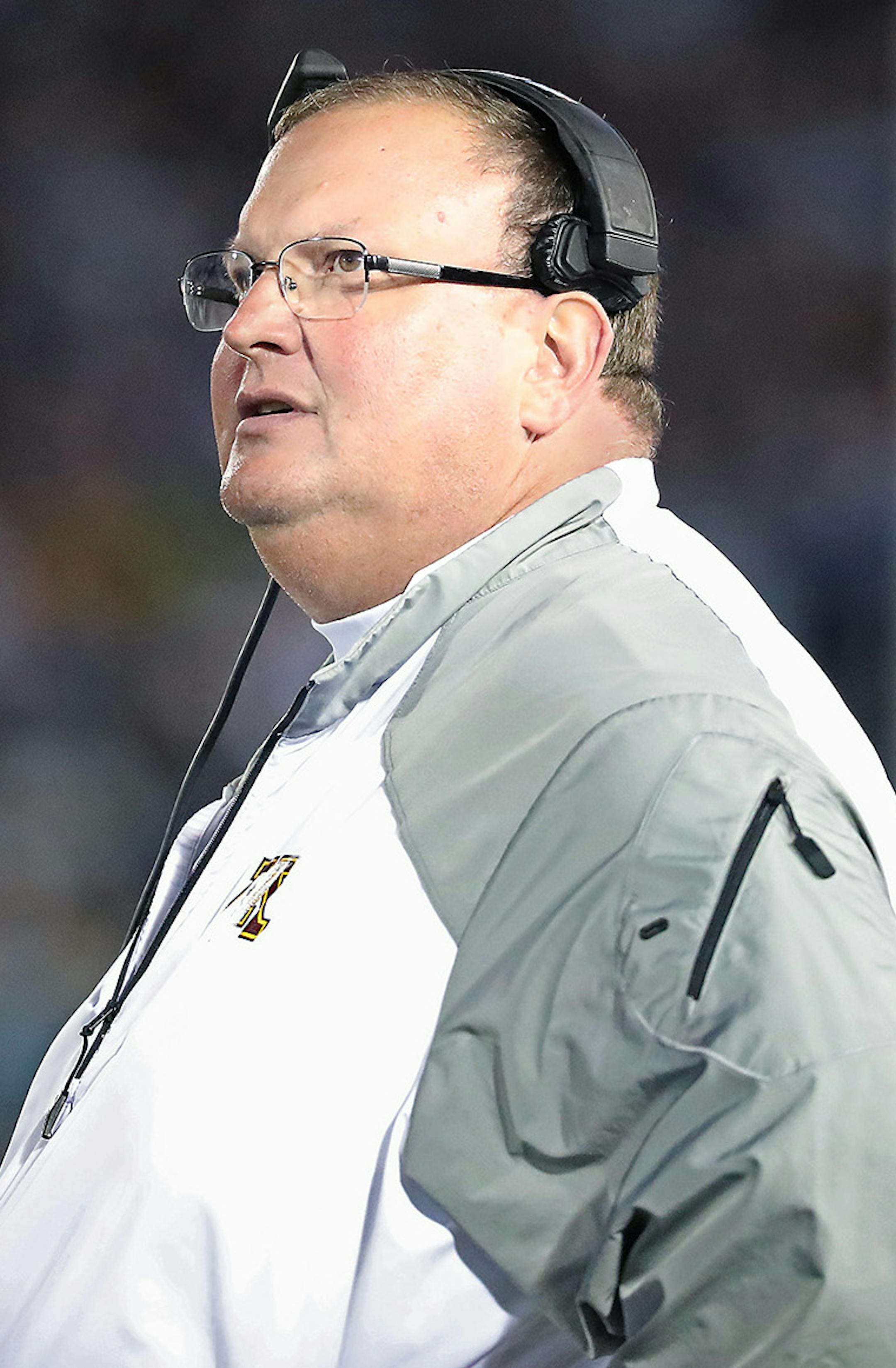 Minnesota's head coach Tracy Claeys looked at the clock to call a time out in the fourth quarter as Minnesota took on Penn State at Beaver Stadium, Saturday, October 1, 2016 in State College, PA. ] (ELIZABETH FLORES/STAR TRIBUNE) ELIZABETH FLORES • eflores@startribune.com