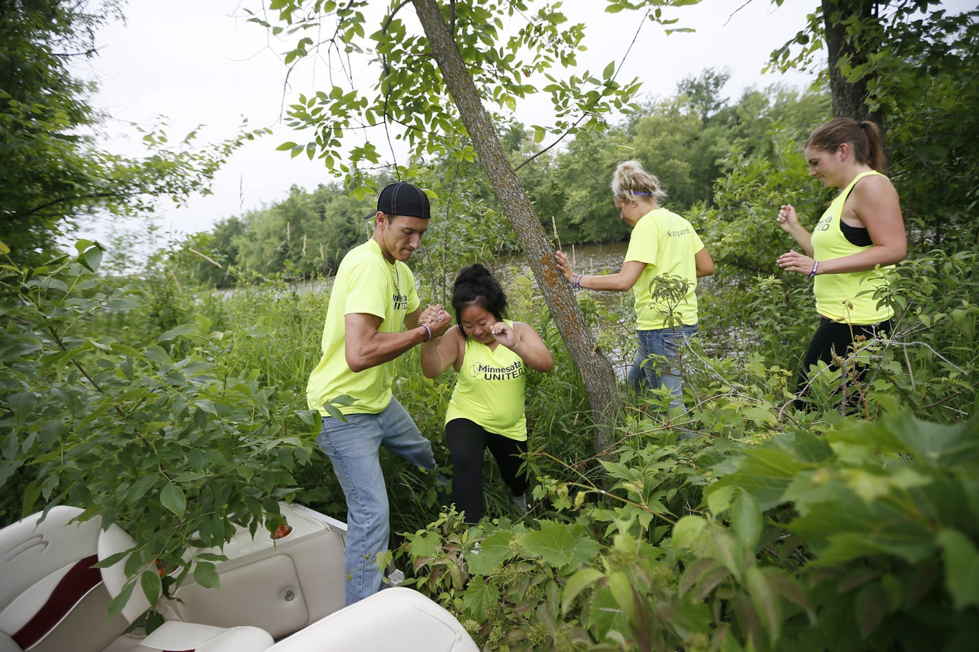 Steven Matula helped Nora Mobarry as they searched an Island near Mississippi River Park Sunday July 14, 2013 In Rice Minnesota. For the first time in weeks, Steven Matula, the brother of missing Eden Prairie woman Mandy Matula, will join other friends, family and volunteers to search for his sister Sunday on the Mississippi River near St. Cloud. Mandy Matula, 24, disappeared May 1, last seen with ex-boyfriend David Roe, who fatally shot himself in the head outside the Eden Prairie Police Depart