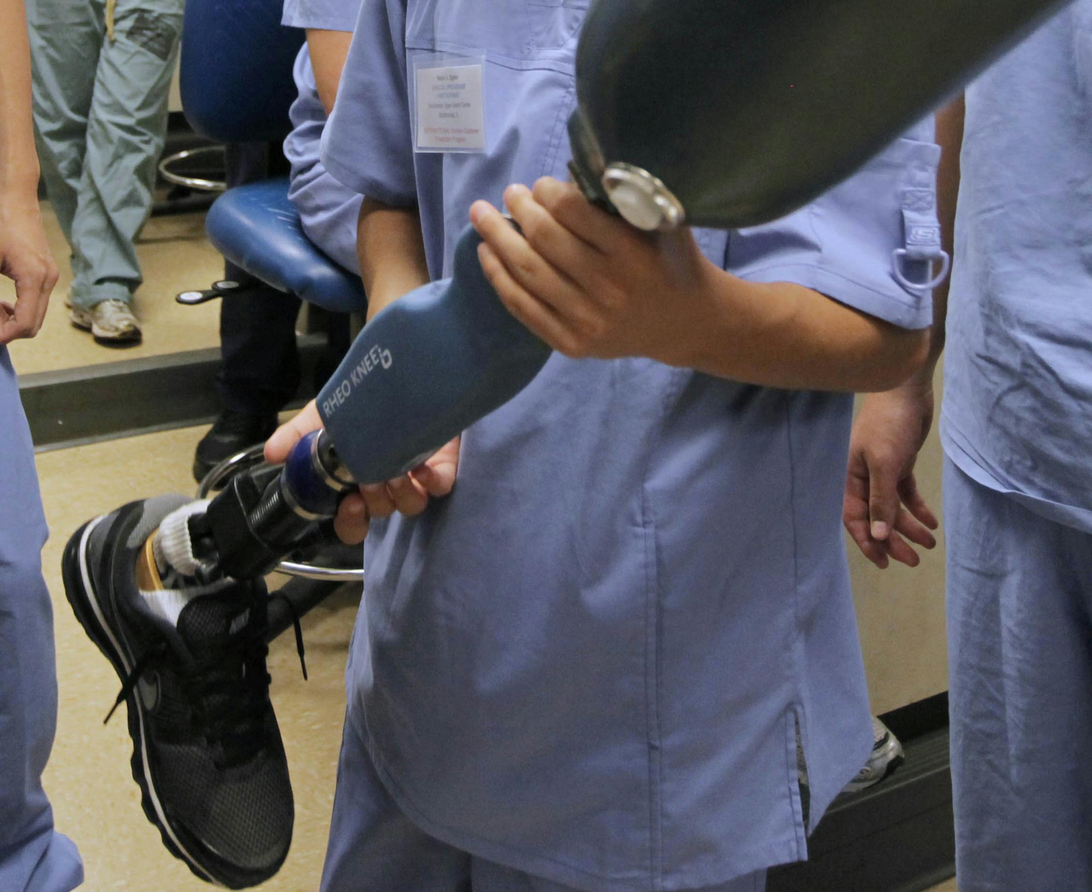 Aug. 2, 2011: Noah Egler, 13, of Bourbonnais, Ill,. holds a prosthetic leg during a workshop on electronic prosthetics at the Indiana University Northwest medical school.
