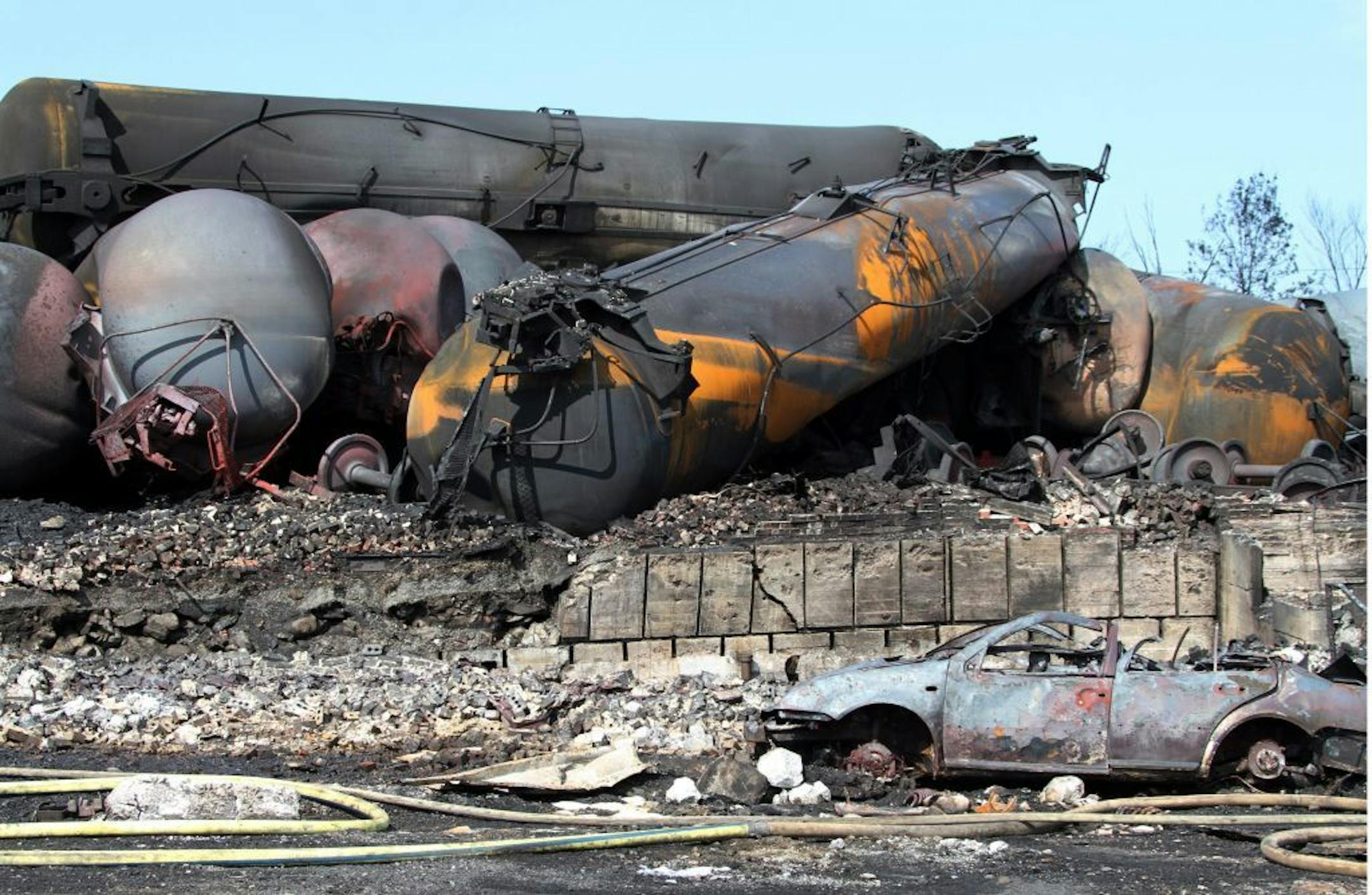 This photo provided by Surete du Quebec, shows wrecked oil tankers and debris from a runaway train in Lac-Megantic, Quebec, Canada.