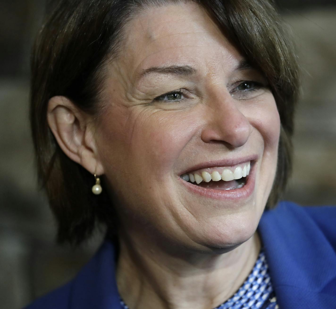 Democratic presidential candidate Sen. Amy Klobuchar, D-Minn., smiles during a campaign event at a coffee shop Monday, Sept. 30, 2019, in Seattle. (AP Photo/Elaine Thompson)