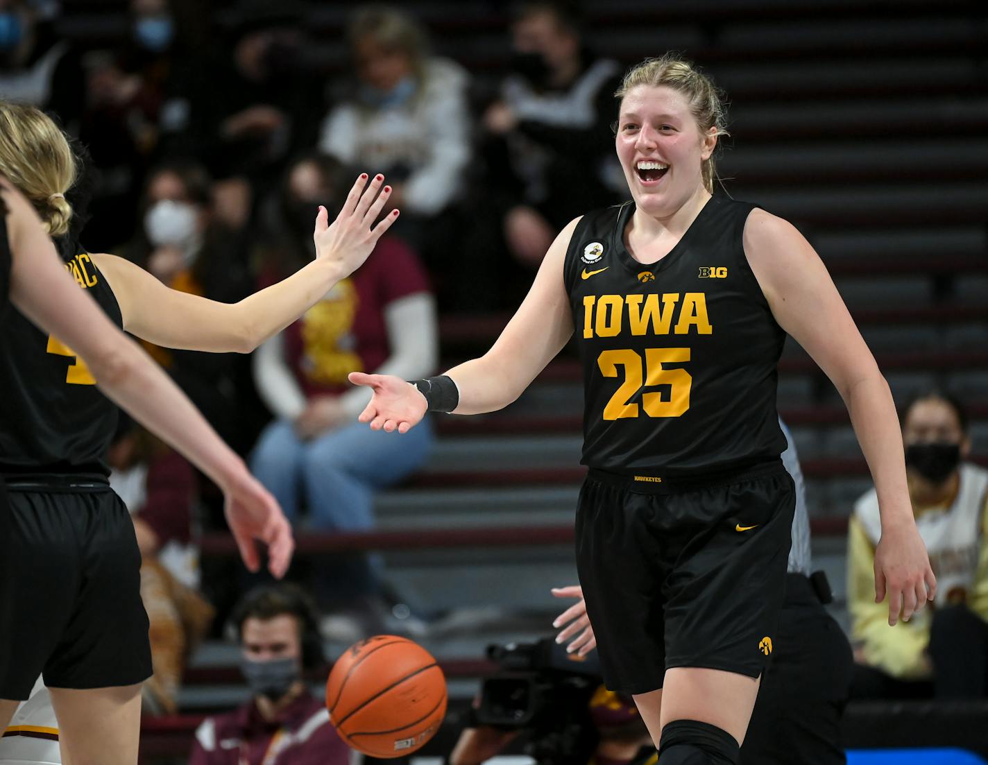 Iowa Hawkeyes forward Monika Czinano (25) celebrates a layup scored during the second half of a women's basketball game between the Minnesota Gophers and the Iowa Hawkeyes Thursday, Jan. 20, 2022 at Williams Arena in Minneapolis, Minn. ] AARON LAVINSKY • aaron.lavinsky@startribune.com