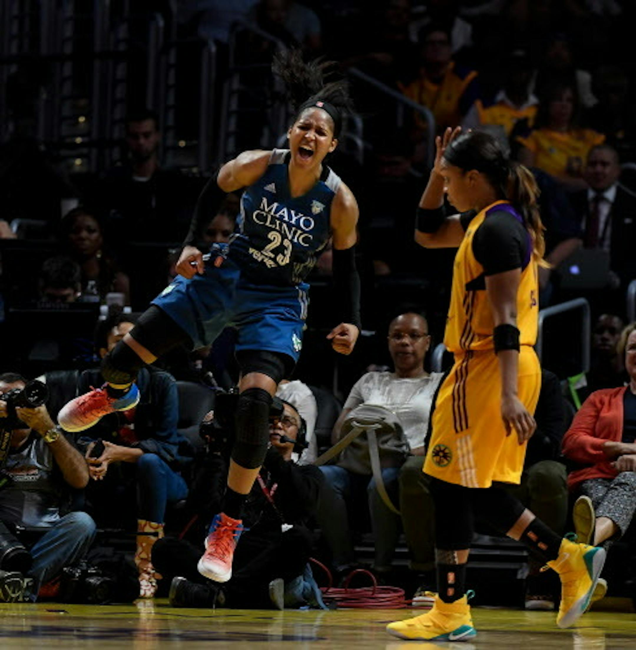 Minnesota Lynx forward Maya Moore (23) celebrates after scoring a layup while being fouled by Los Angeles Sparks forward Candace Parker (3) for an and-one opportunity in the fourth quarter of game four of the WNBA Finals on Sunday, Oct. 1, 2017 at Staples Center in Los Angeles, Calif. (Aaron Lavinsky/Minneapolis Star Tribune/TNS) ORG XMIT: 1212354