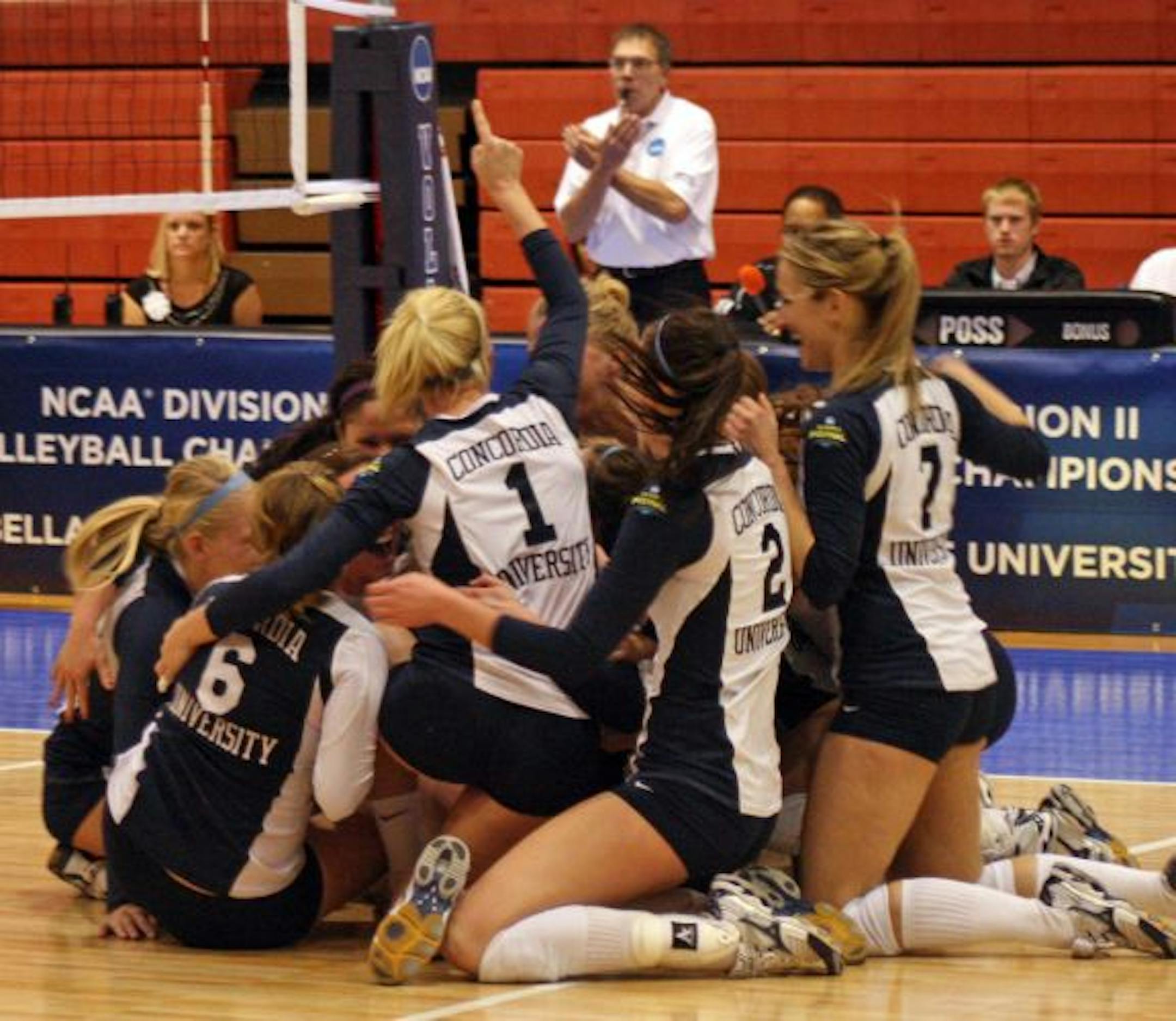 provided photo / Stephen Batchers/Concordia the concordia volleyball team celebrates after match point against in their victoery over Tampa at Louisvile KY