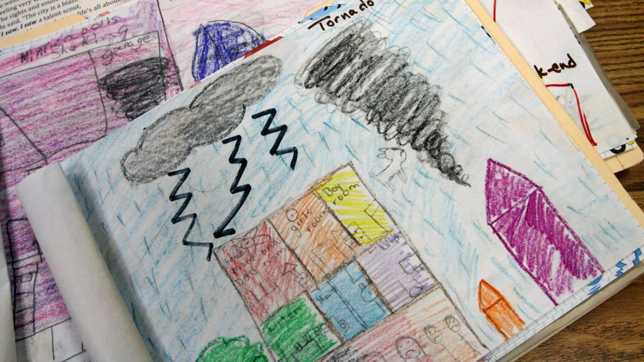 (left to right) Detail of pictures made by Cityview Elementary teacher Colleen Barksdale's class that recalled the events of the North Minneapolis toronado through personal journals, stories and pictures.