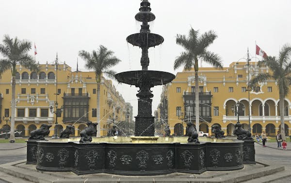 Downtown Lima's main attraction, Plaza Mayor, is home to the Government Palace and the impressive Cathedral de Lima. [ Photos by Chris Riemenschneider