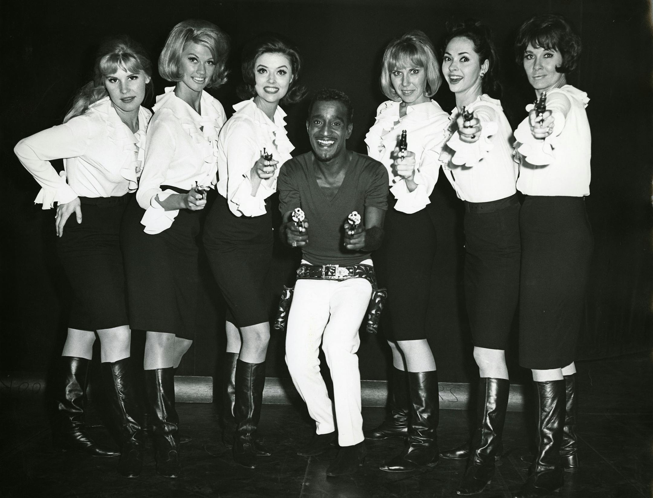 Sammy Davis Jr. takes aim in a backstage photo with his dancers in the "American Masters" documentary "Sammy Davis Jr.: I've Gotta Be Me."
credit: The Estate of Altovise Davis