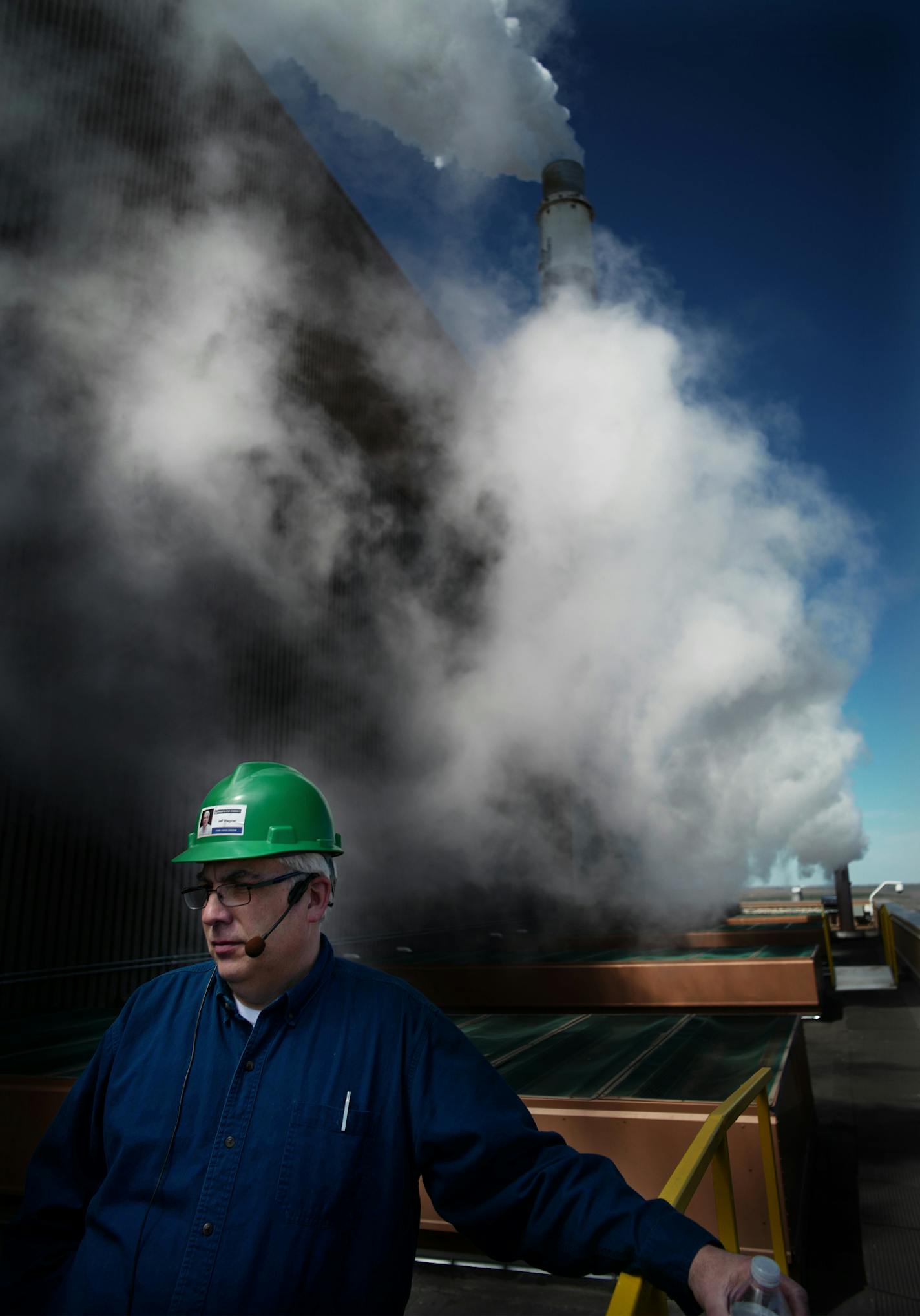 Jeff Wagner of Coal Creek Station stands on a rooftop where behind him one of the emissions stacks can be seen. The plant uses approximately 22,000 tons of lignite per day, or about 7.5 to 8.0 million tons per year.] Coal Creek Station is supplied with coal from the Falkirk Mining Company next door. The two operations work in tandem to maximize efficiencies in producing electricity.Richard Tsong-Taatarii&#xef;richard.tsong-taatarii@startribune.com