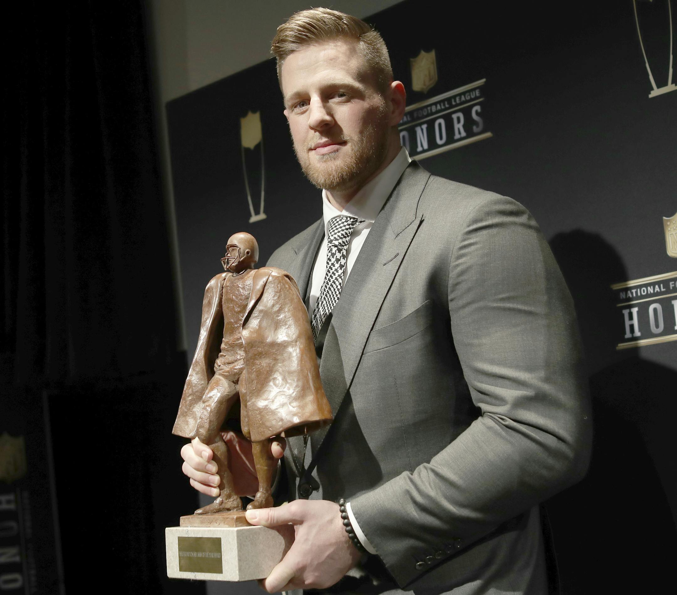 IMAGE DISTRIBUTED FOR NFL - J. J. Watt poses in the press room with the Walter Payton NFL Man of the Year award at the 7th Annual NFL Honors at the Cyrus Northrop Memorial Auditorium on Saturday, Feb. 3, 2018, in Minneapolis, Minnesota. (Photo by Jeff Lewis/Invision for NFL/AP Images)
