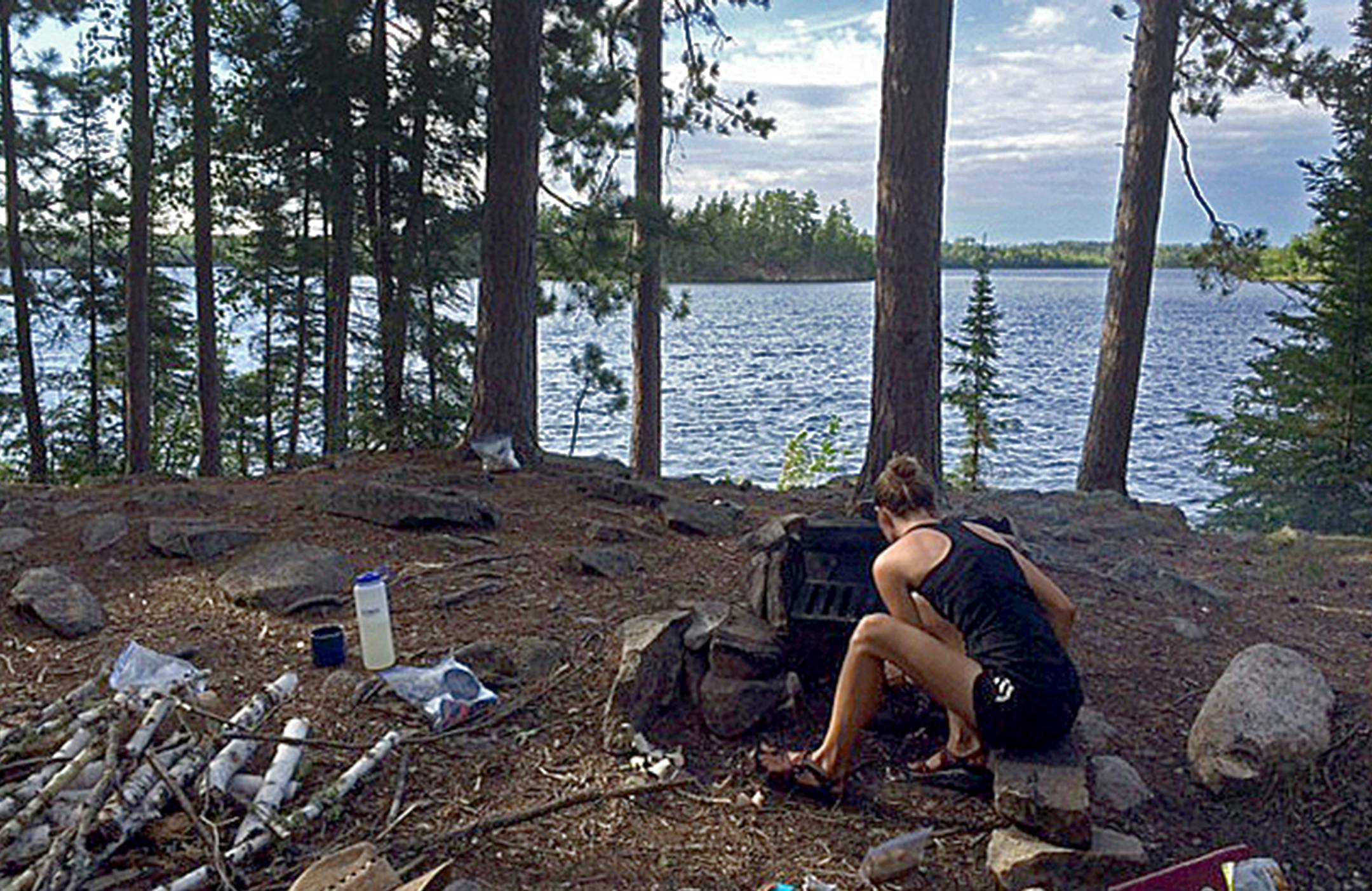 Damp wood hampered attempts to build a steady fire. The sisters finally succeeded on the second evening of their BWCA trip.