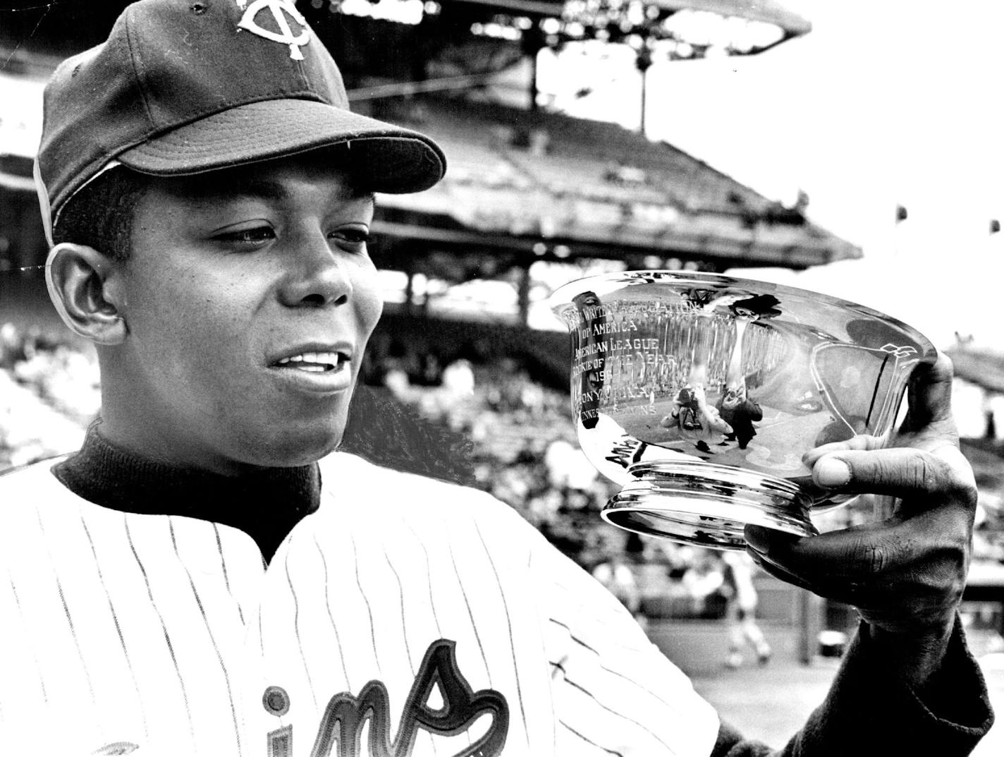 April 19, 1965 Tony Oliva receives trophy as the American League Rookie of the Year for 1964 before Sunday's 6-3 Twins victory over Cleveland from the Baseball Writers Association of America. Oliva was presented the award by chairman Bob Martel and vice-chairman Bill Hengen of the Twin Cities chapter of BWAA. April 18, 1965 June 4, 1986 John Croft, Minneapolis Star Tribune