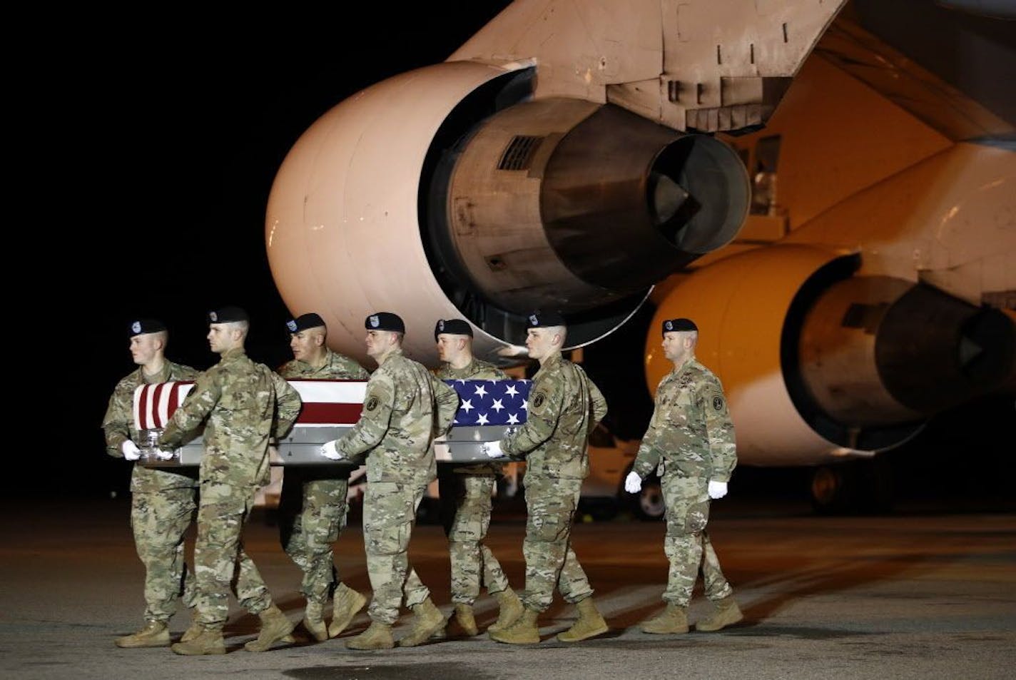 A day before officials announced the death of three U.S. soldiers in Afghanistan, a U.S. Army carry team moved a transfer case containing the remains of Sgt. Leandro A. Jasso at Dover Air Force Base, Del. Jasso, 25, of Leavenworth, Wash., died Nov. 24, 2018, during combat operations in Helmand province, Afghanistan.