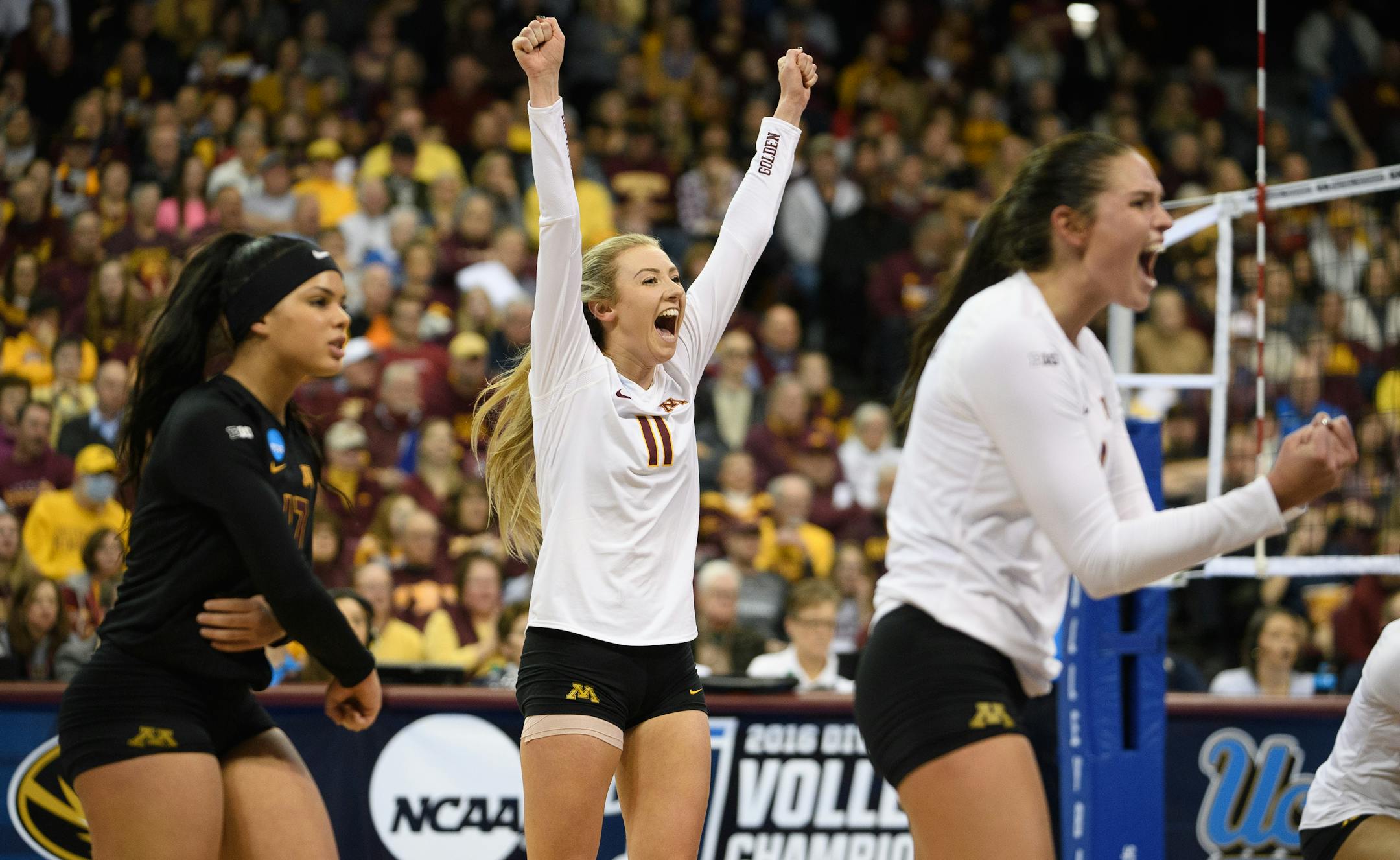 Minnesota libero Dalianliz Rosado (17), setter Samantha Seliger-Swenson (11) and outside hitter Sarah Wilhite (8) celebrated a point in the third set Saturday against UCLA.