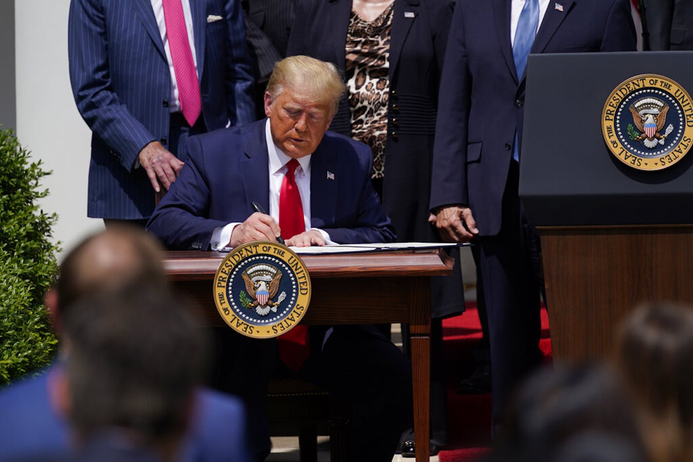 President Donald Trump signed an extension of the Paycheck Protection Program in June. But Congress and the White House haven't agreed on a new aid to businesses and consumers, leading Trump to issue an executive order that has businesses wondering how to comply.